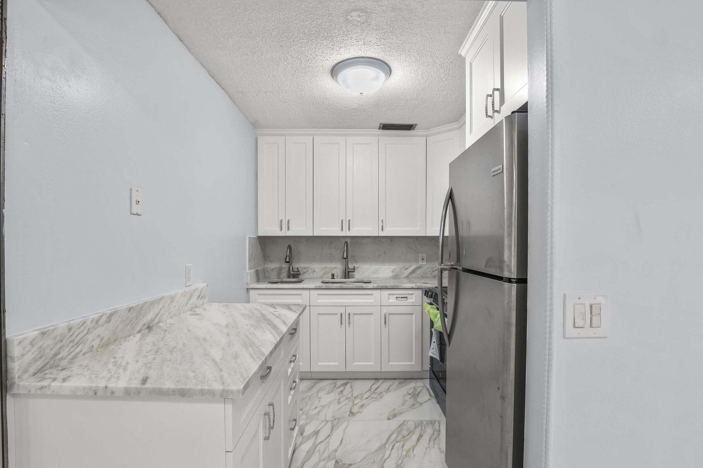 63 Hastings D, West Palm Beach, FL 33417 — photo 1 of 31