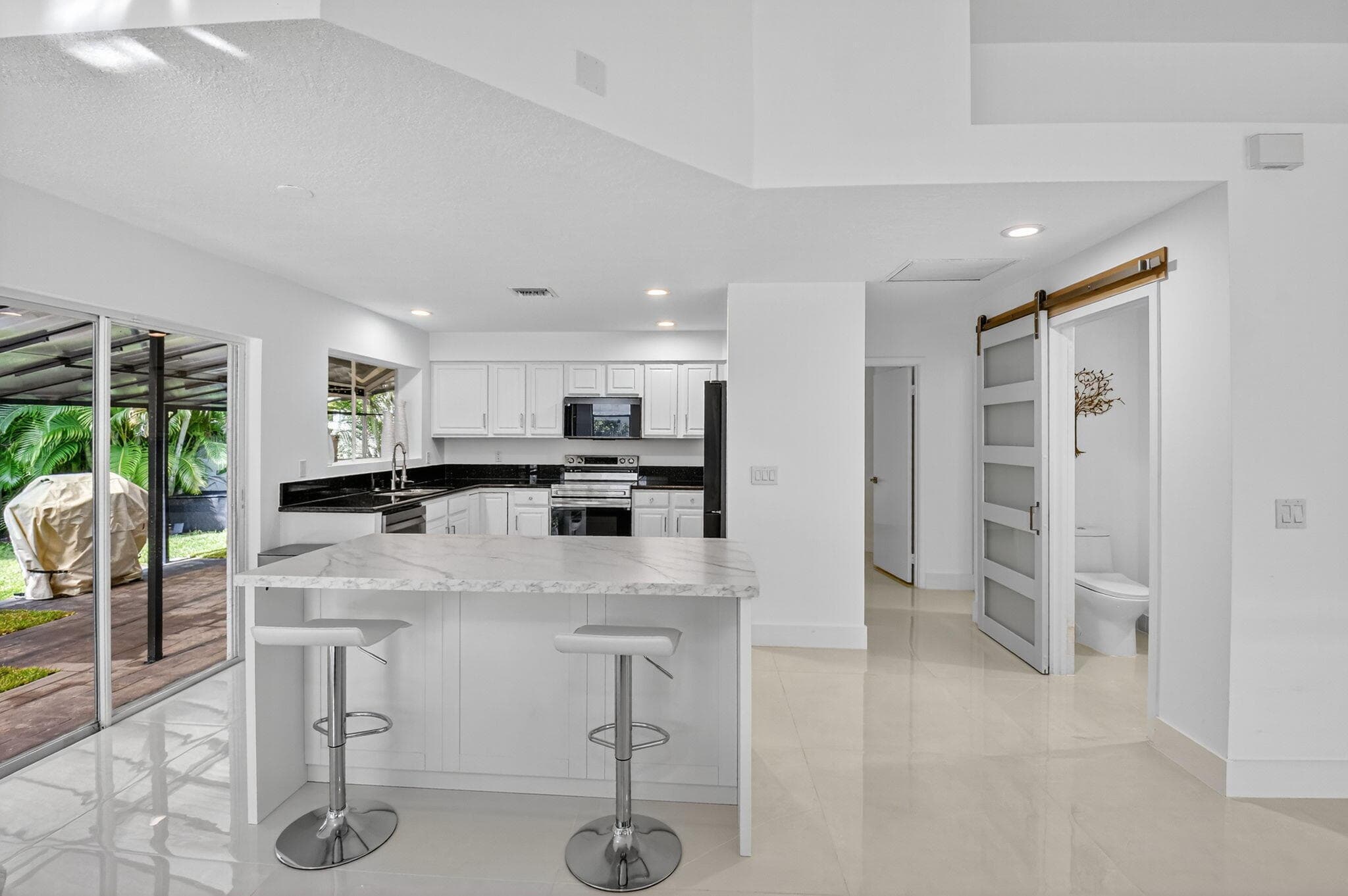 2218 NW 52nd Street, Boca Raton, FL 33496 — photo 8 of 39
