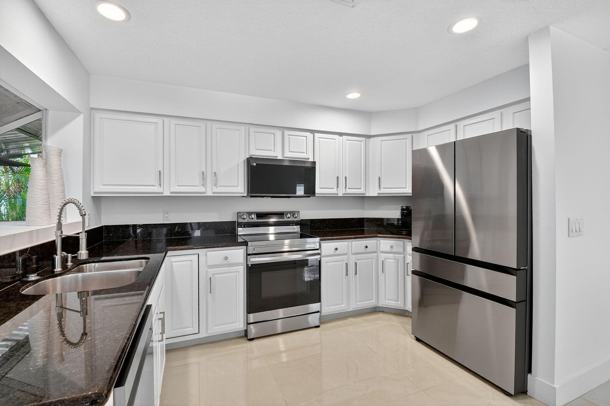 2218 NW 52nd Street, Boca Raton, FL 33496 — photo 10 of 39