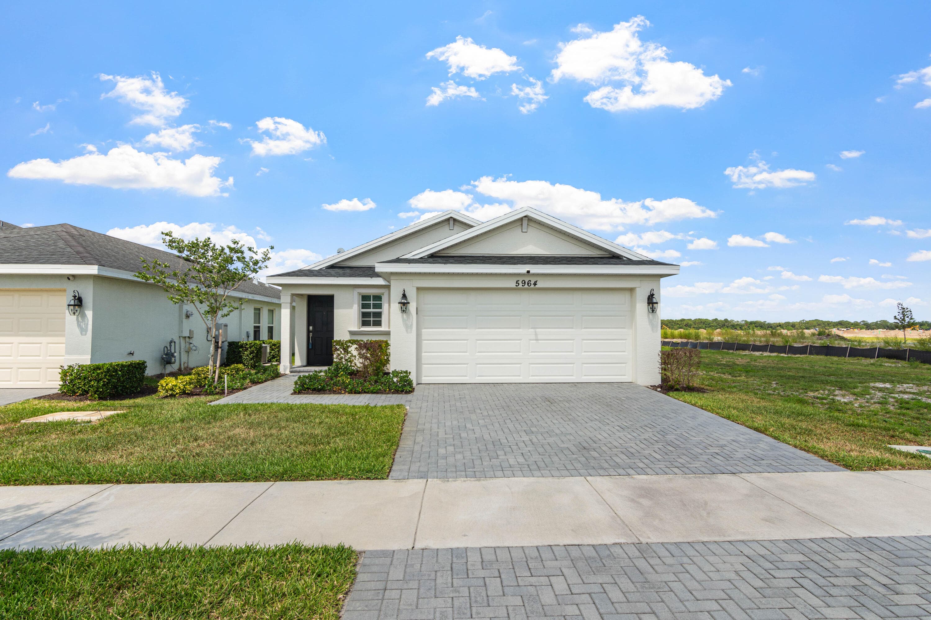 5964 NW Sweetwood Drive, Port St. Lucie, FL 34987 — photo 3 of 72