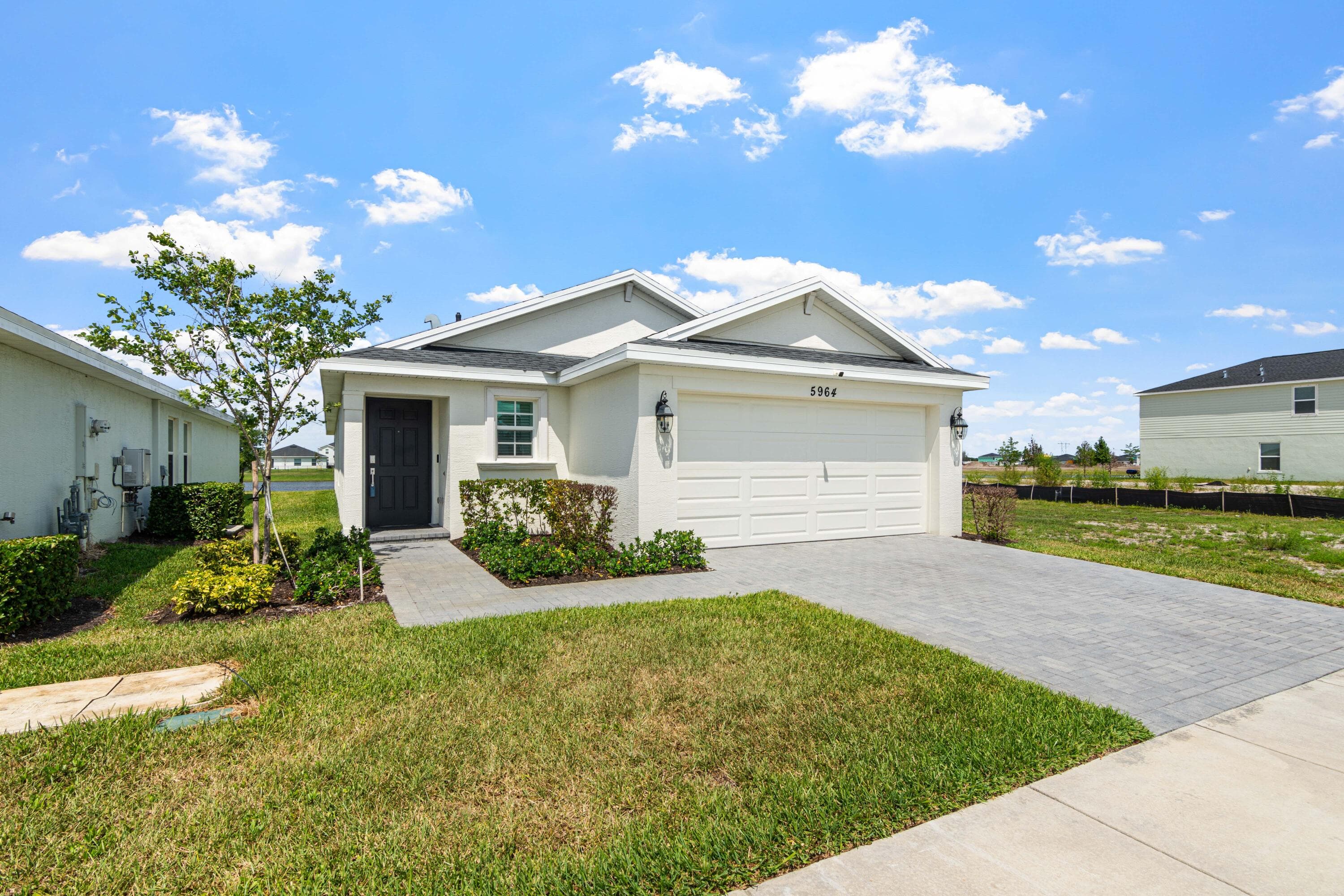 5964 NW Sweetwood Drive, Port St. Lucie, FL 34987 — photo 2 of 72