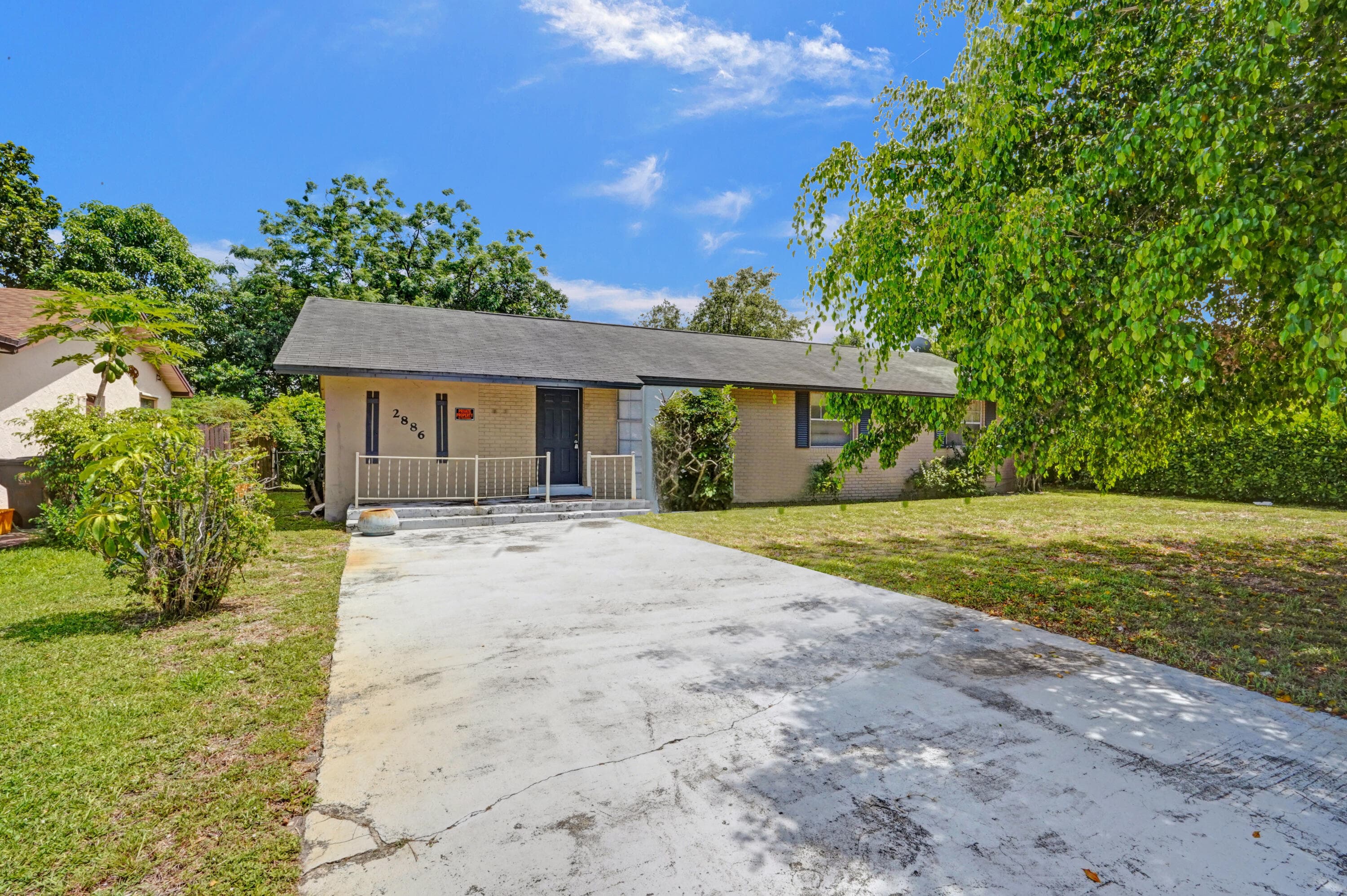 2886 Floral Road, Lake Worth, FL 33462 — photo 1 of 51