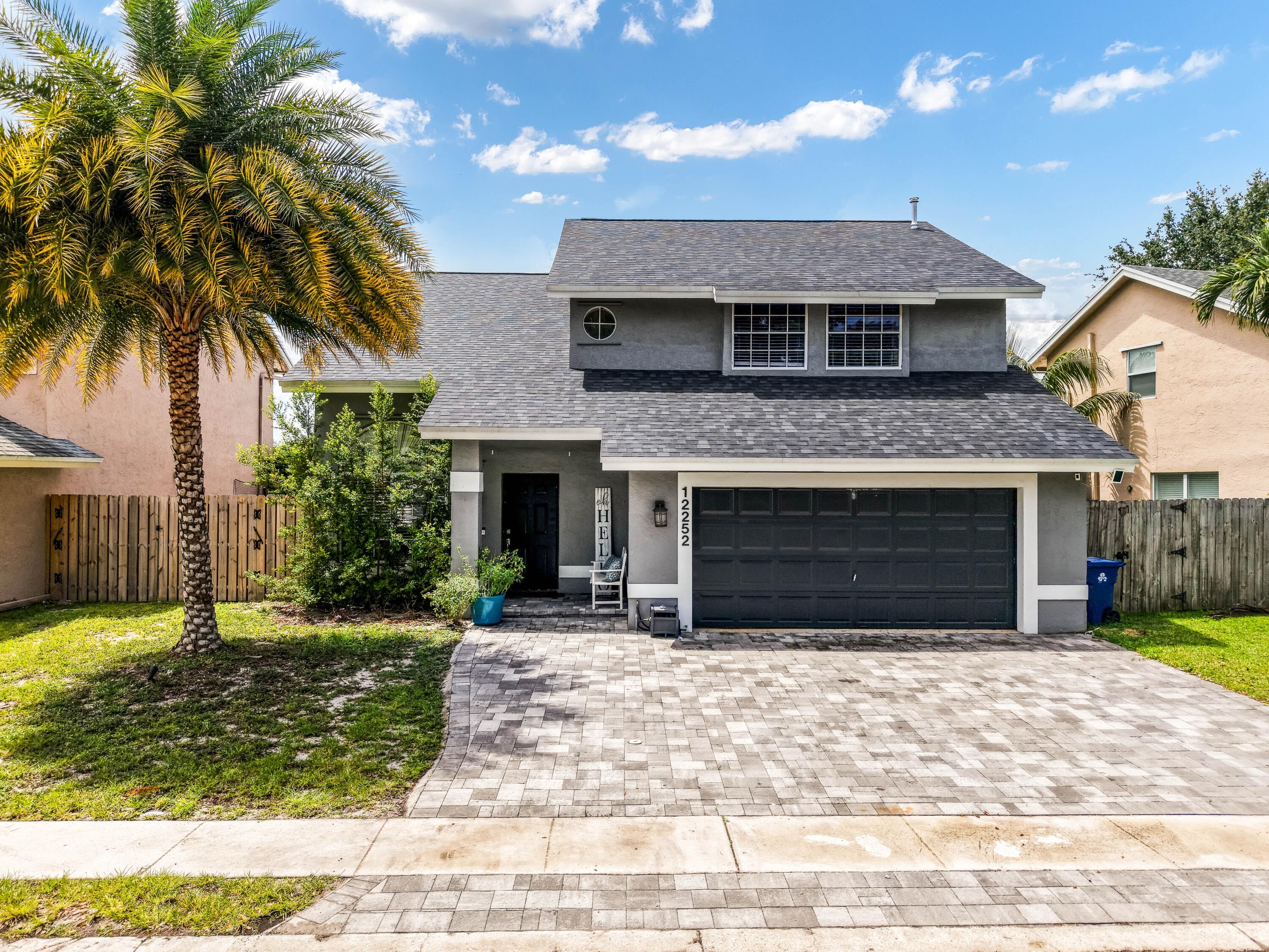 12252 NW 32nd Manor, Sunrise, FL 33323 — photo 1 of 54