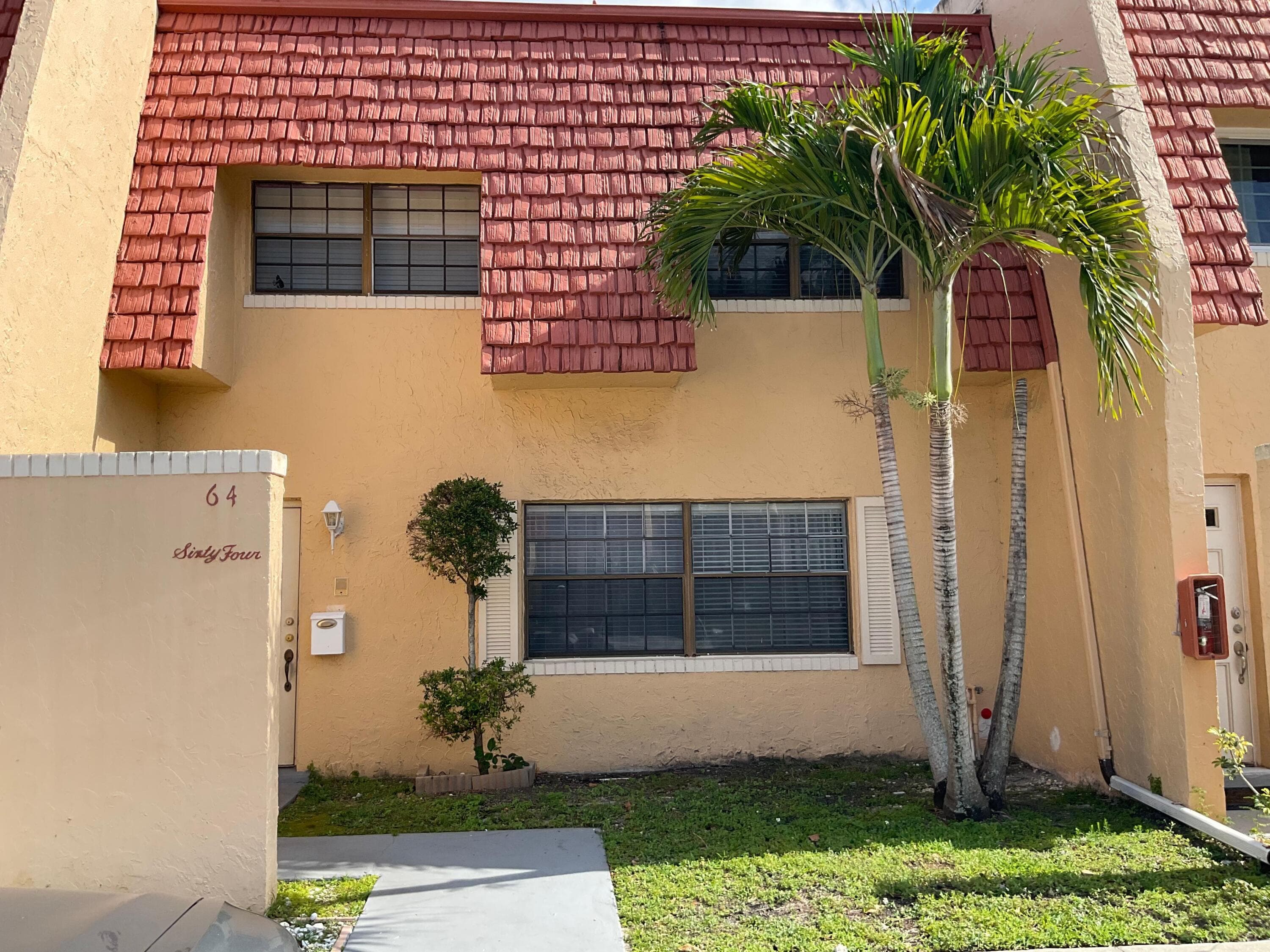 64 Canterbury Lane, Tamarac, FL 33319 — photo 1 of 36