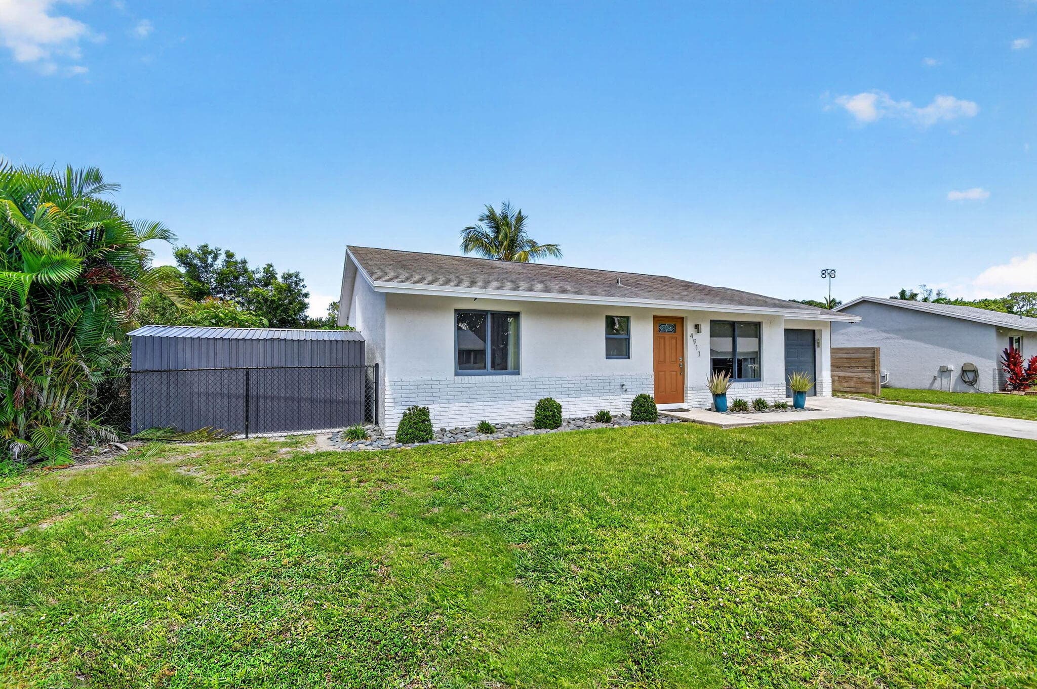 4911 Neros Drive, Greenacres, FL 33463 — photo 10 of 48