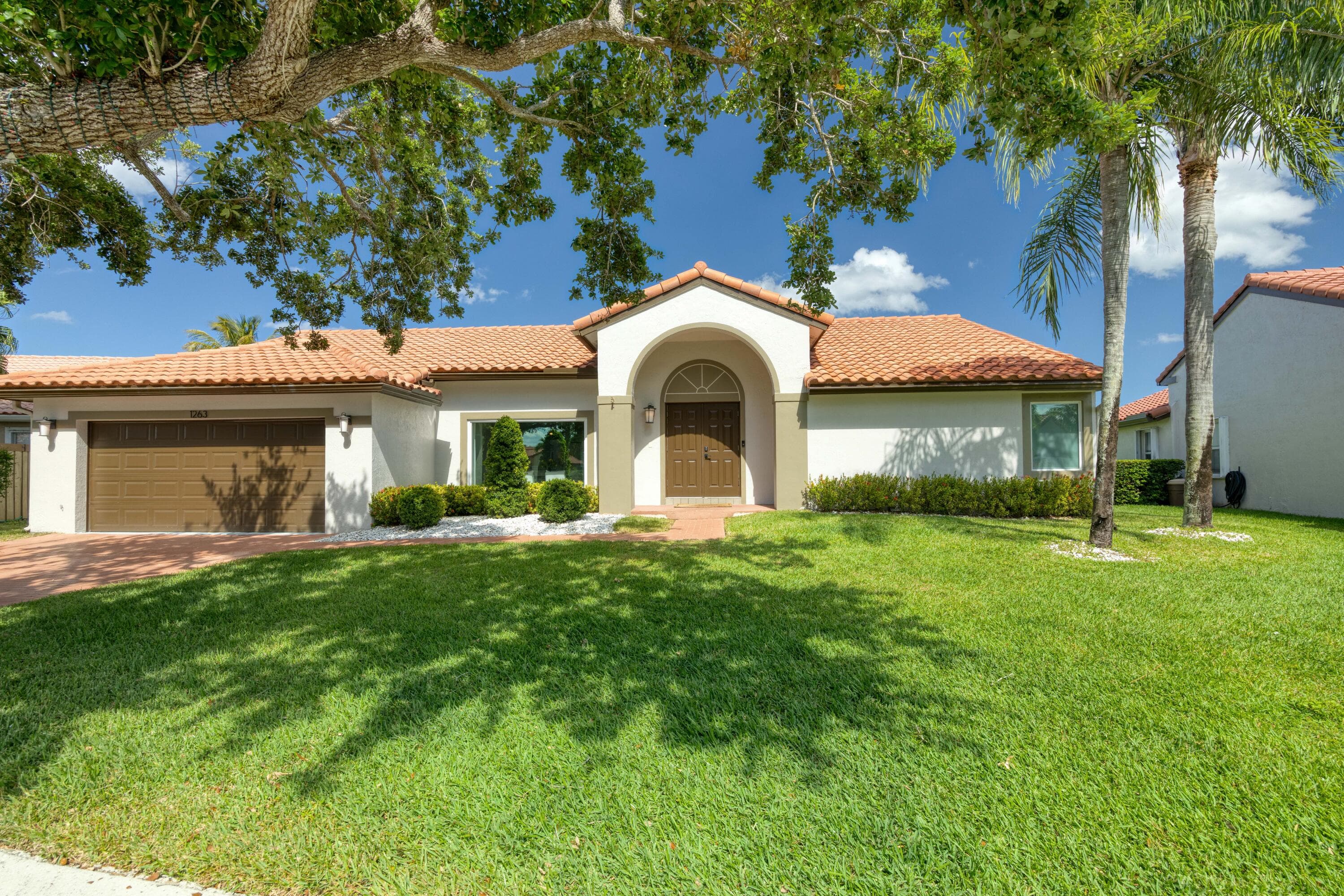1263 NW 127th Drive, Sunrise, FL 33323 — photo 1 of 21