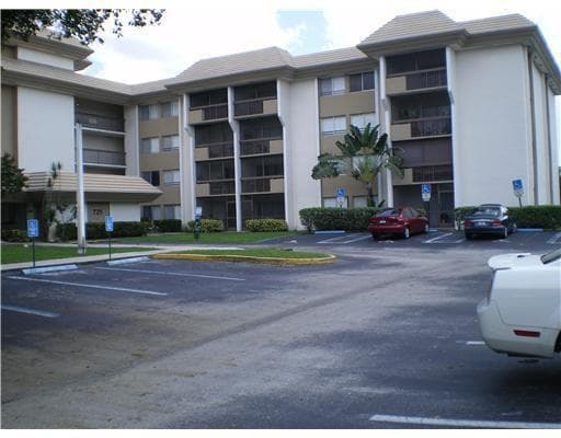 711 N Pine Island Road 213, Plantation, FL 33324 — photo 1 of 18