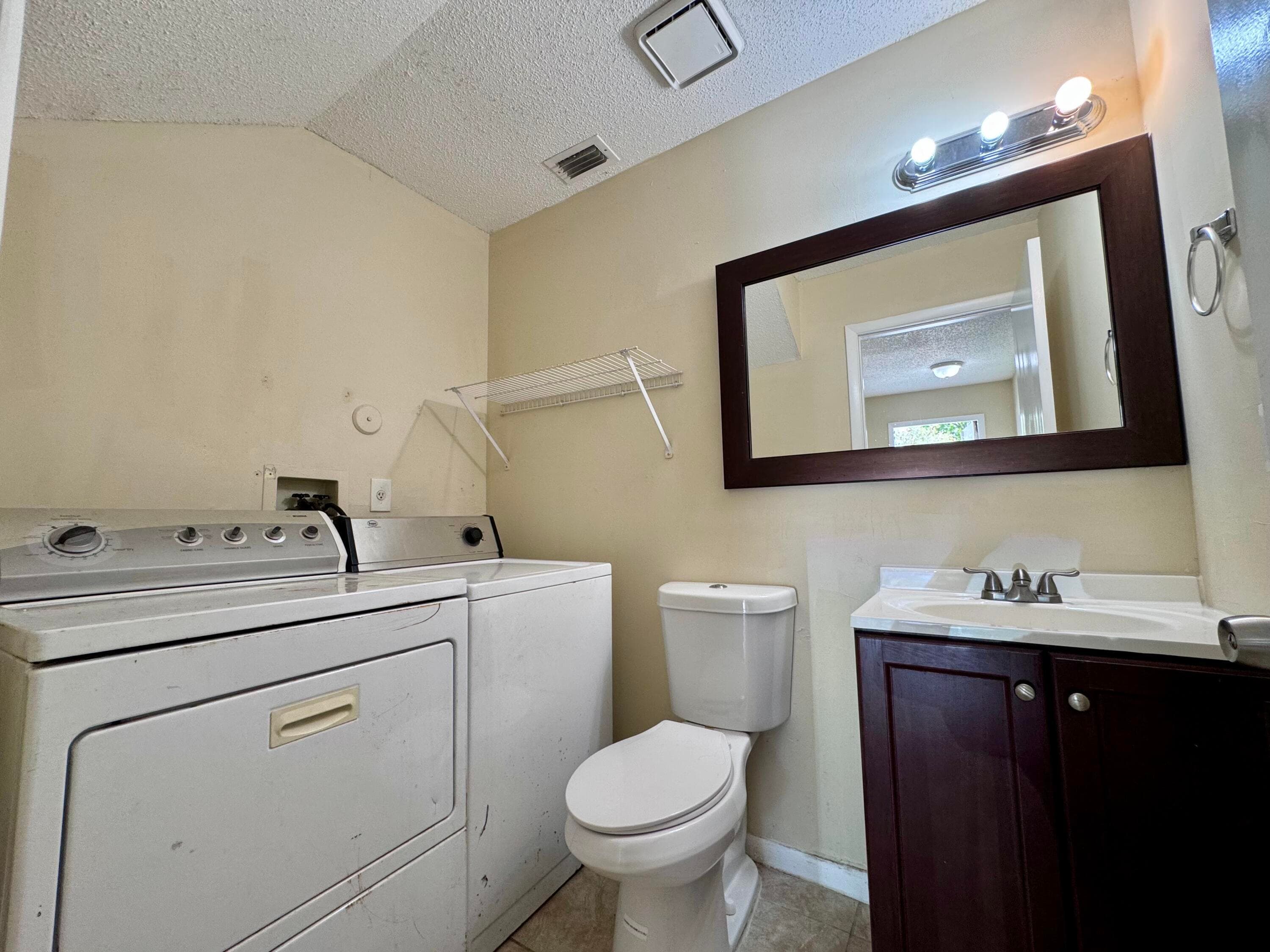 704 Riverside Drive, Greenacres, FL 33463 — photo 10 of 38