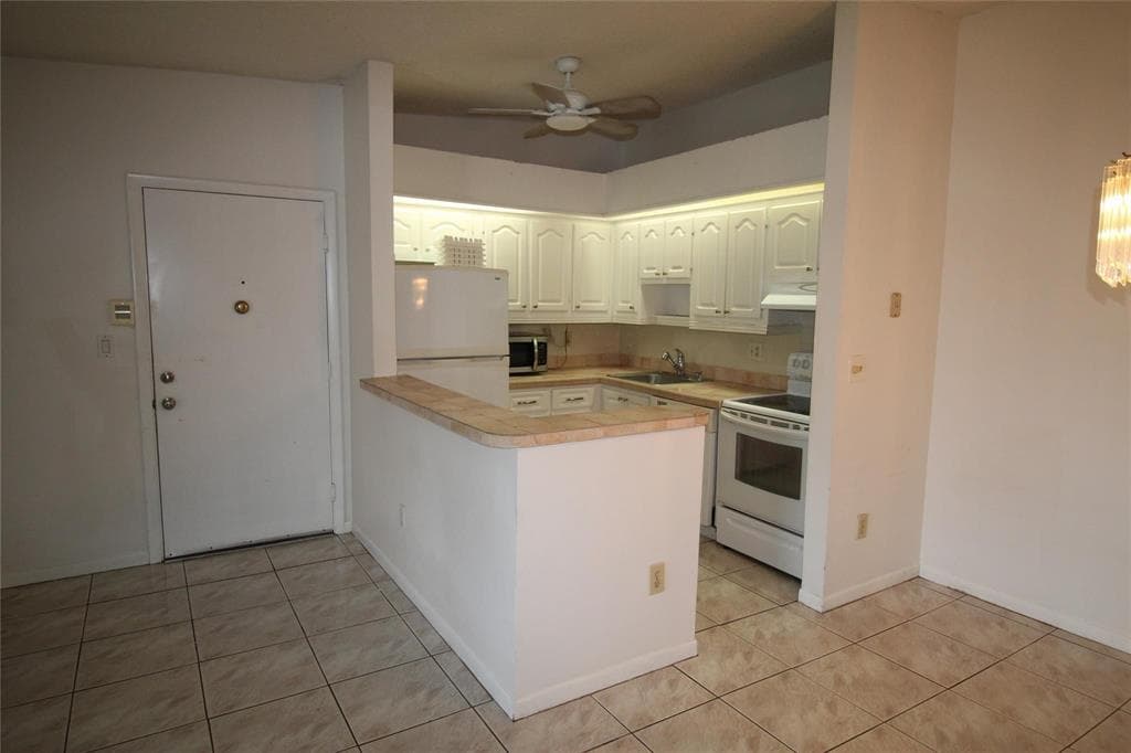 9728 S Belfort Circle 206, Tamarac, FL 33321 — photo 2 of 10