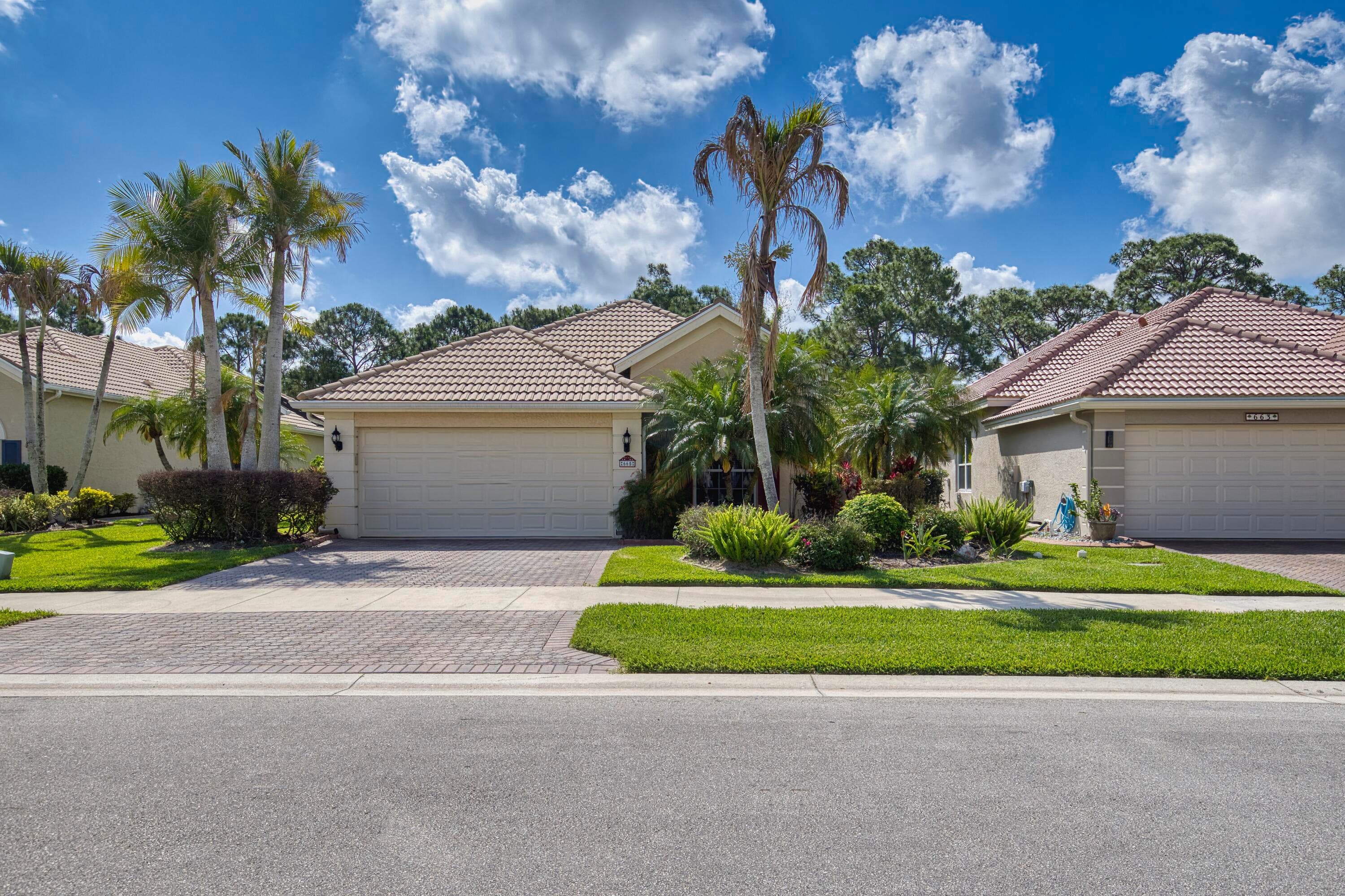 665 SW Andros Circle, Port St. Lucie, FL 34986 — photo 1 of 55