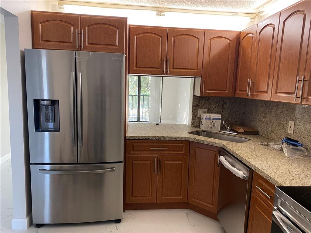 11615 NW 28th Street 4, Coral Springs, FL 33065 — photo 1 of 17