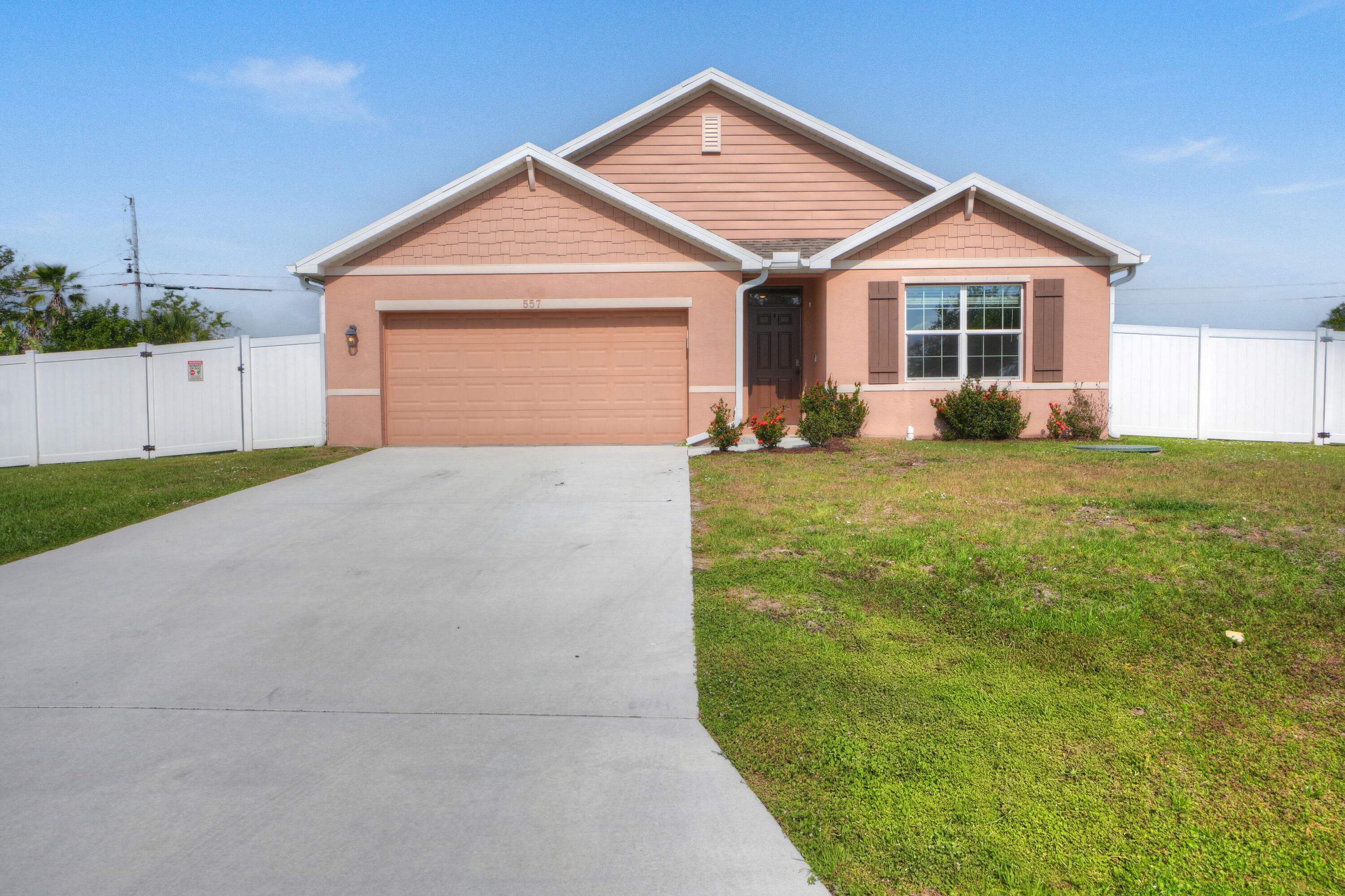 557 SW Columbus Drive, Port St. Lucie, FL 34953 — photo 2 of 54