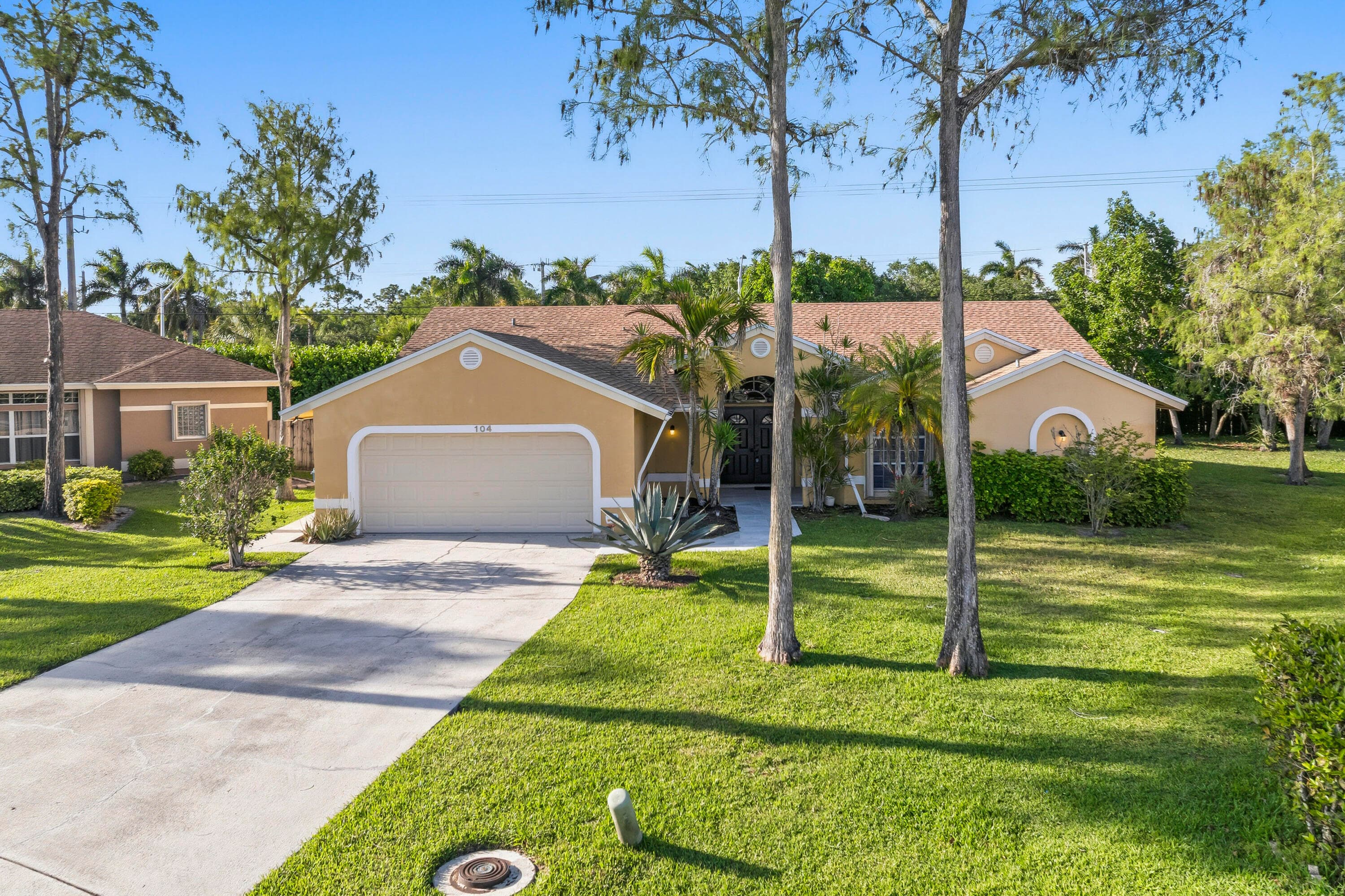 104 Oxford Court, Royal Palm Beach, FL 33411 — photo 1 of 46