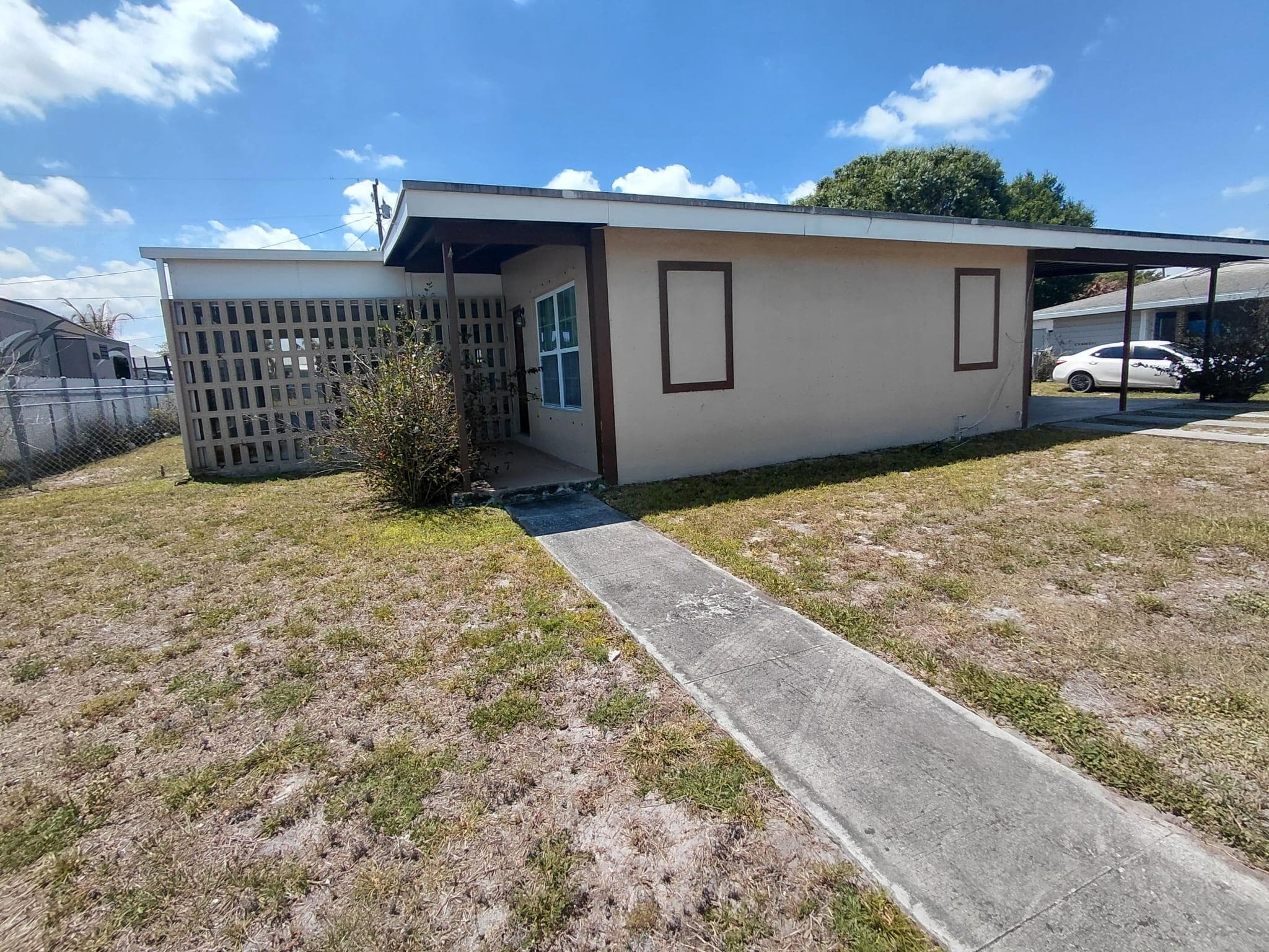 116 NE Prima Vista Boulevard A, Port St. Lucie, FL 34983 — photo 1 of 15