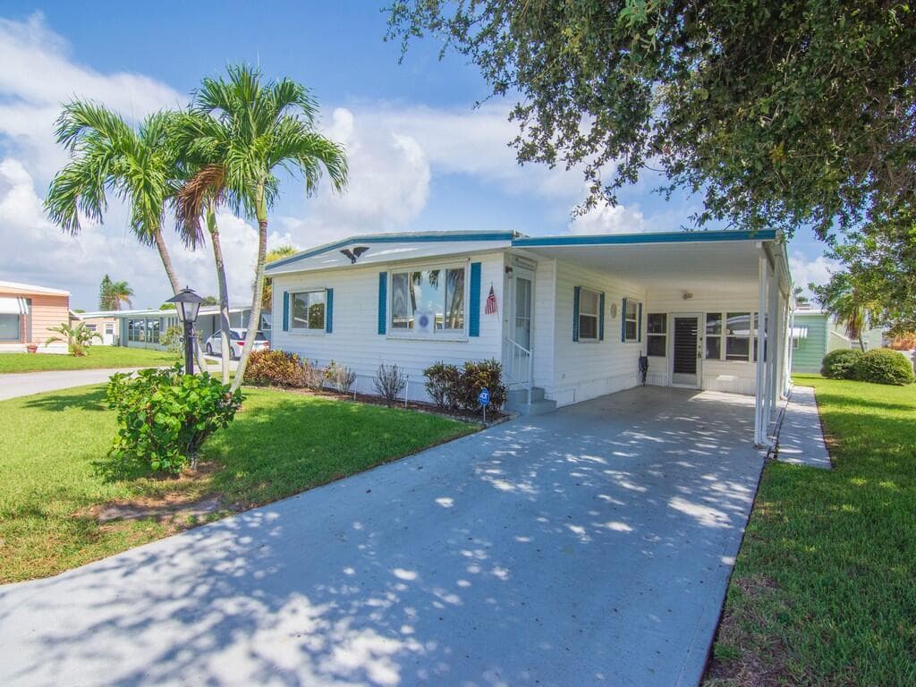264 NE Cameo Way, Jensen Beach, FL 34957 — photo 1 of 34