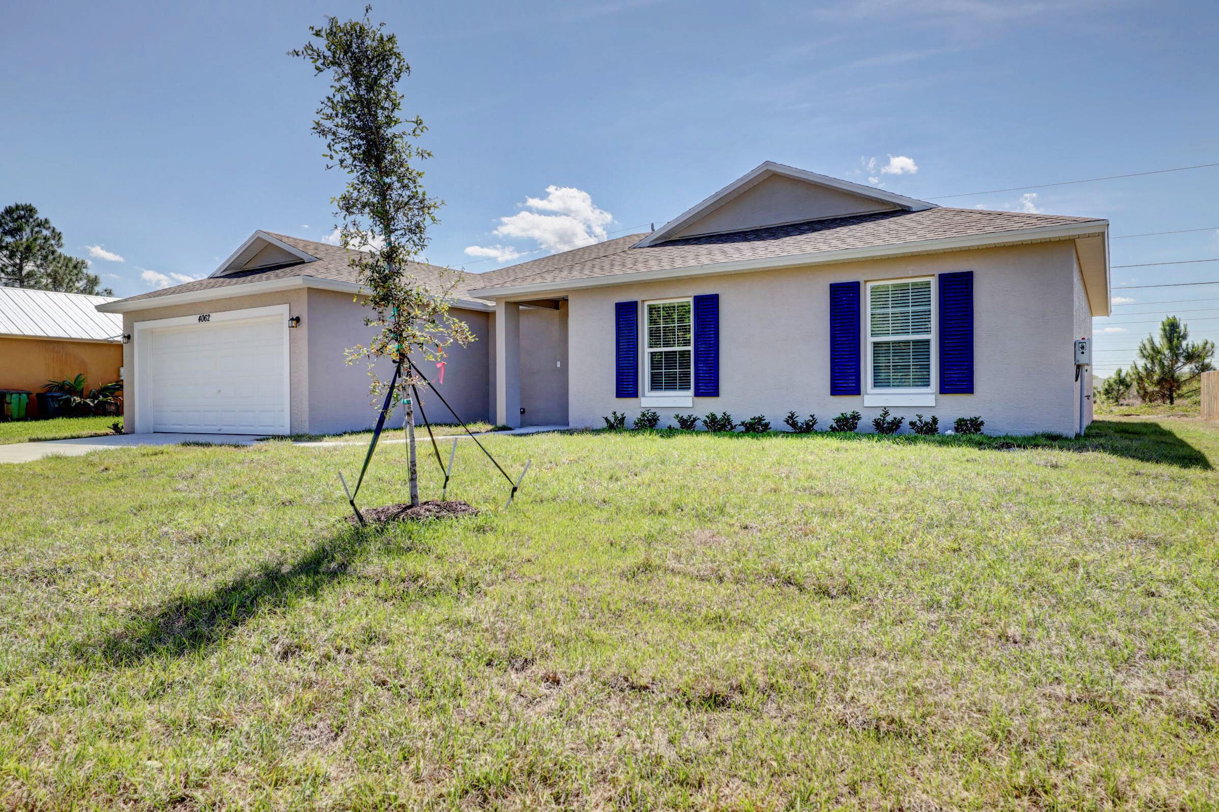 1817 SW Altman Avenue, Port St. Lucie, FL 34953 — photo 1 of 53