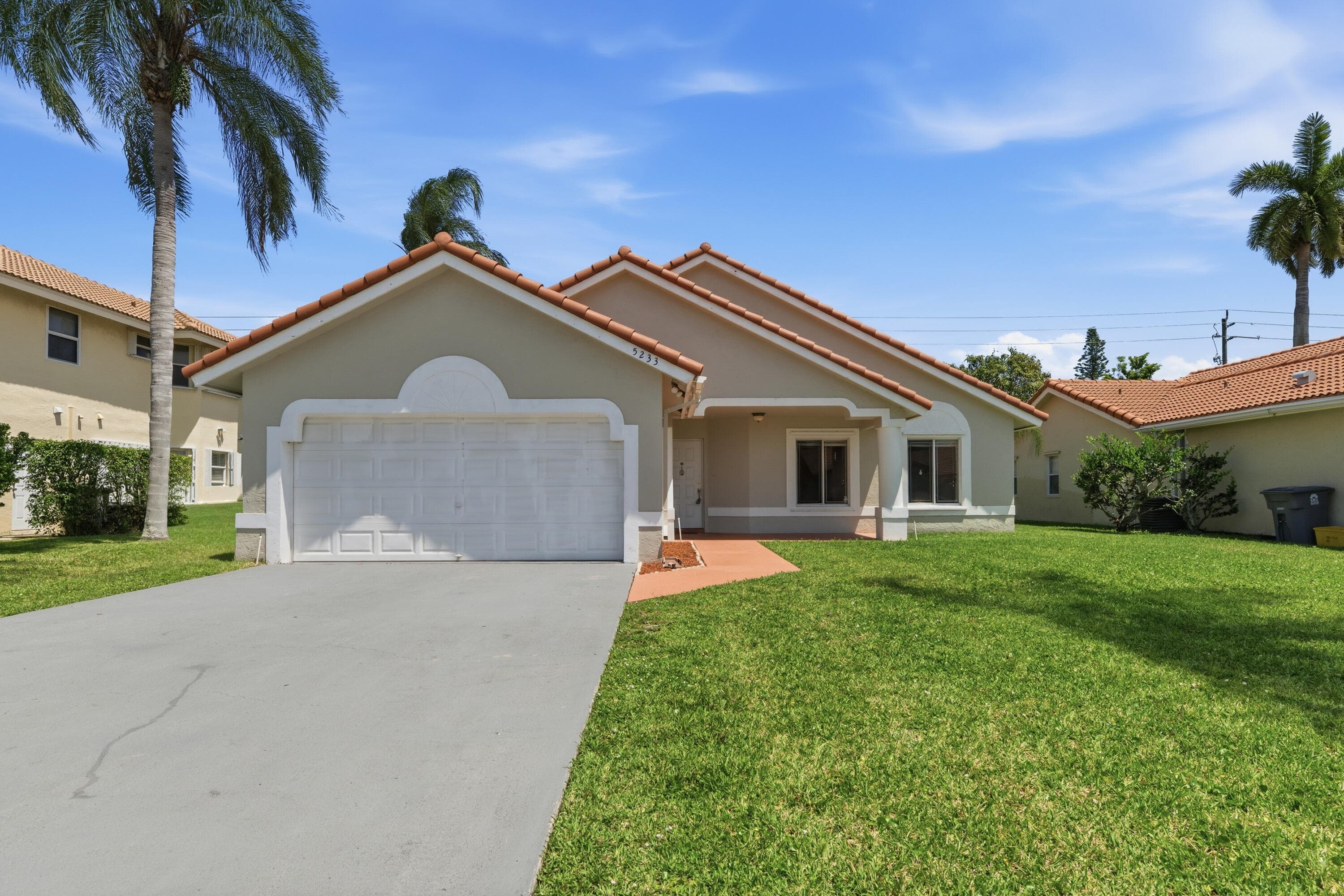 5233 Rosen Boulevard, Boynton Beach, FL 33472 — photo 1 of 31