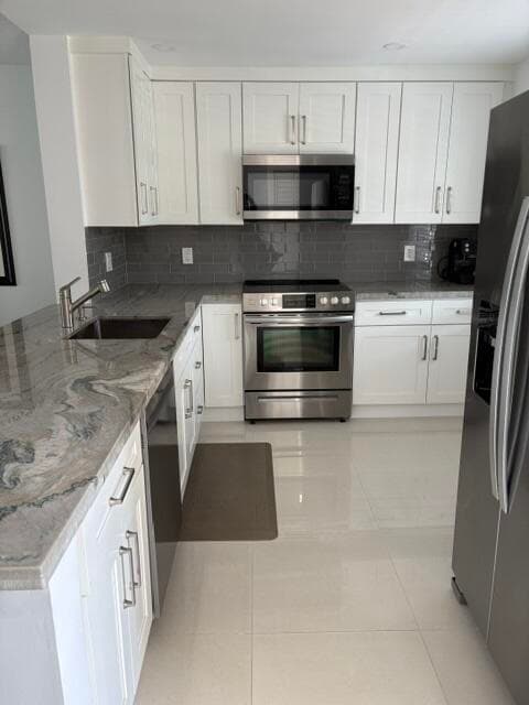 424 SE 10th Street 203, Dania Beach, FL 33004 — photo 1 of 16