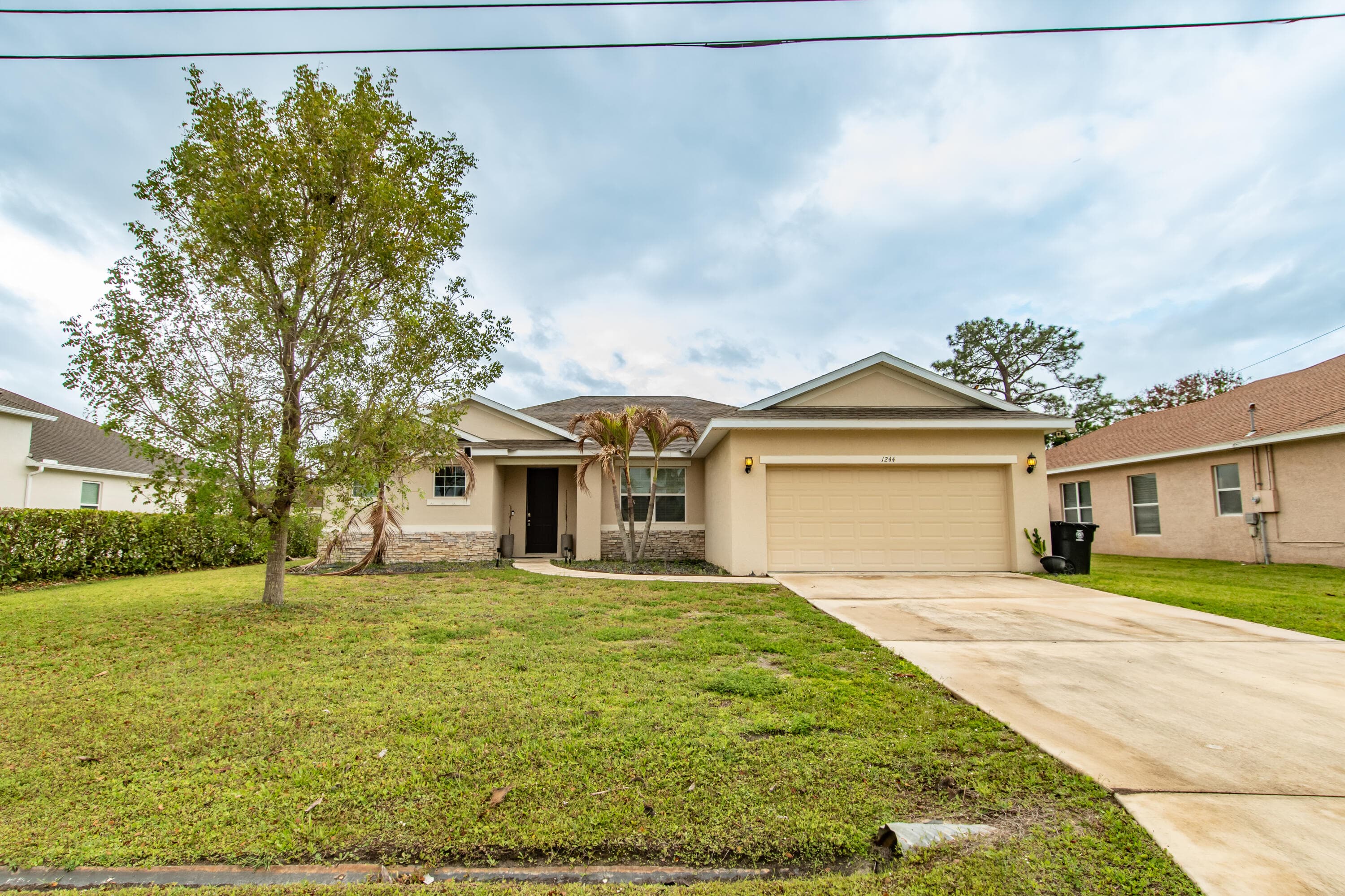 1244 SW Ermine Avenue, Port St. Lucie, FL 34953 — photo 2 of 39