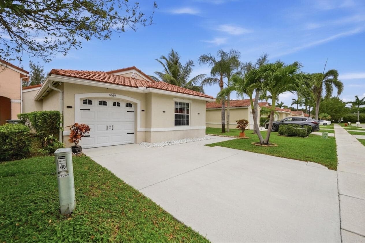 7069 Burgess Drive, Lake Worth, FL 33467 — photo 2 of 41