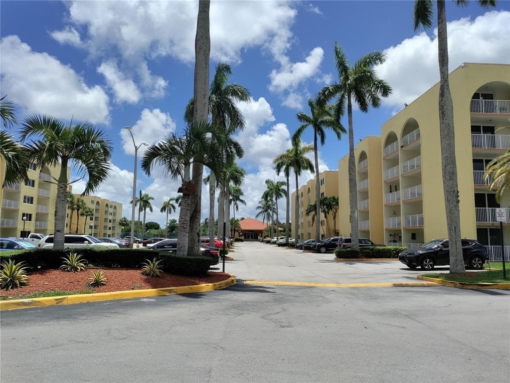 7000 NW 186th Street 4-325, Hialeah, FL 33015 — photo 1 of 21