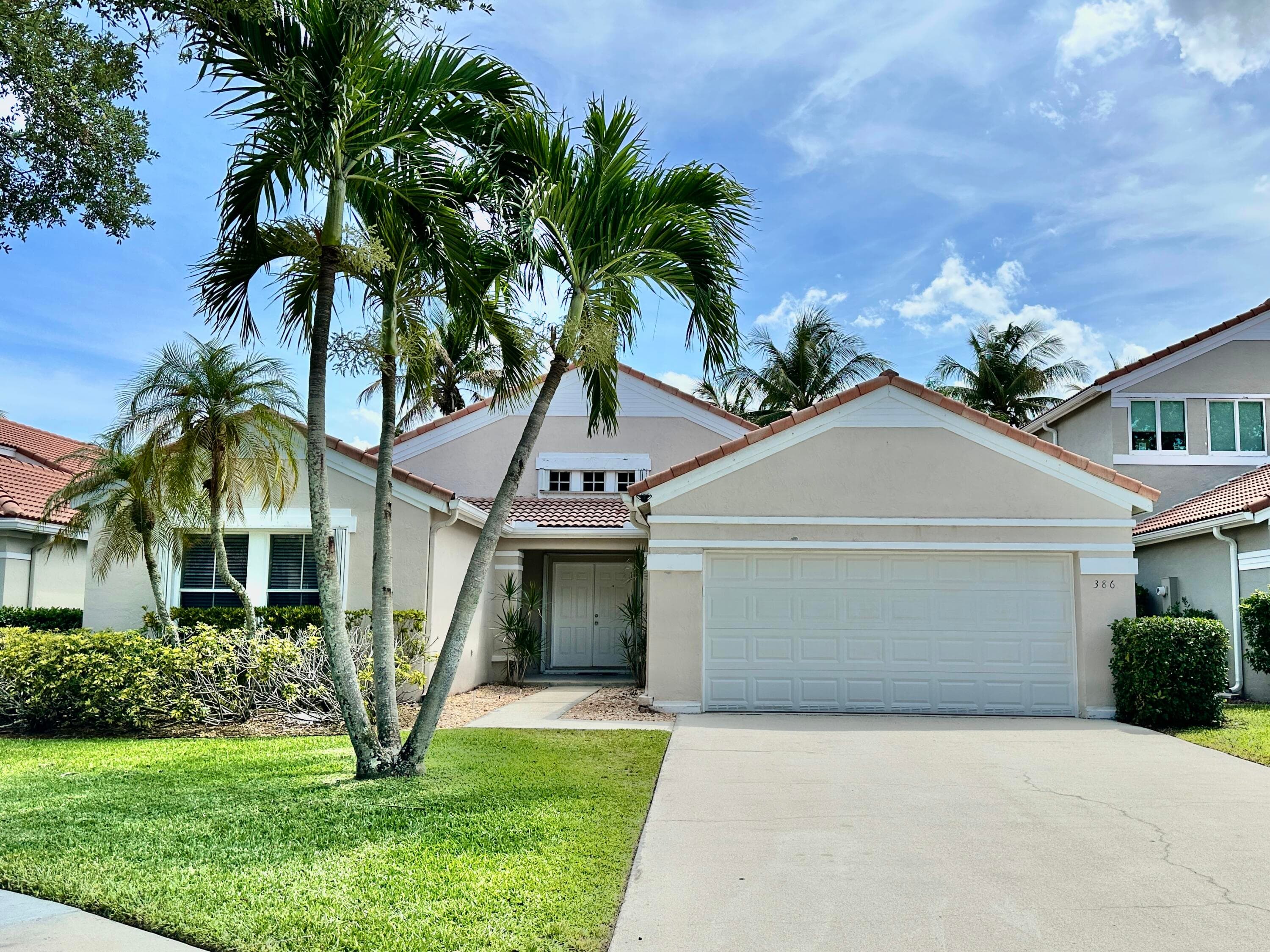386 Carrington Drive, Weston, FL 33326 — photo 1 of 33
