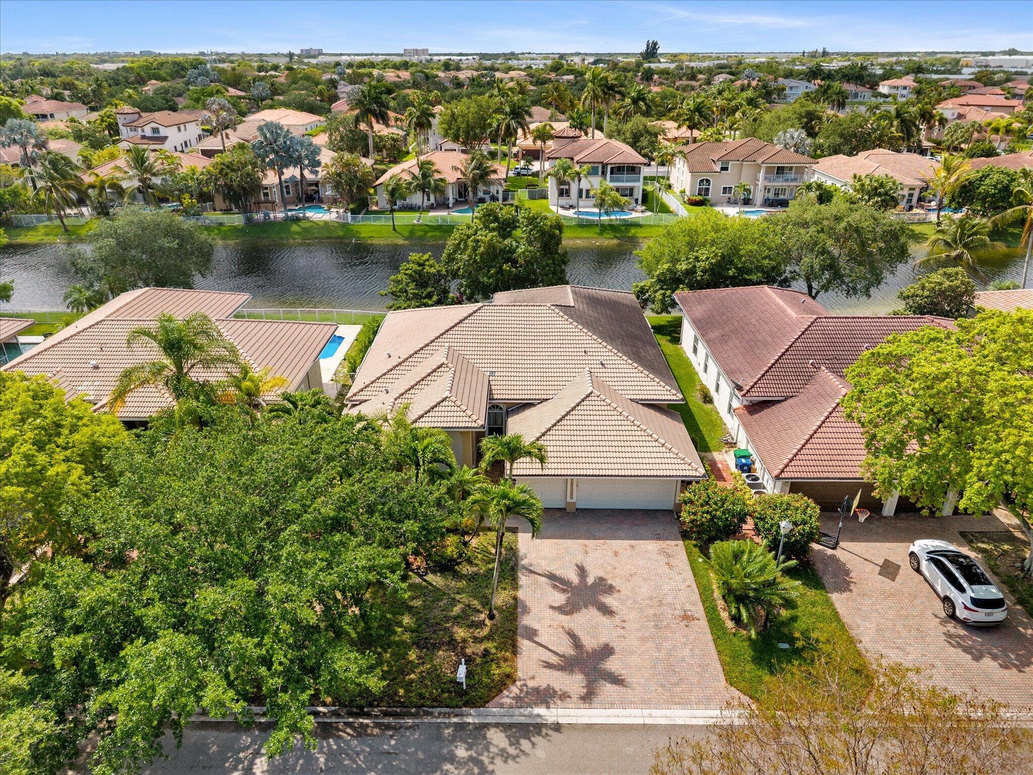 12420 NW 50th Place, Coral Springs, FL 33076 — photo 1 of 36