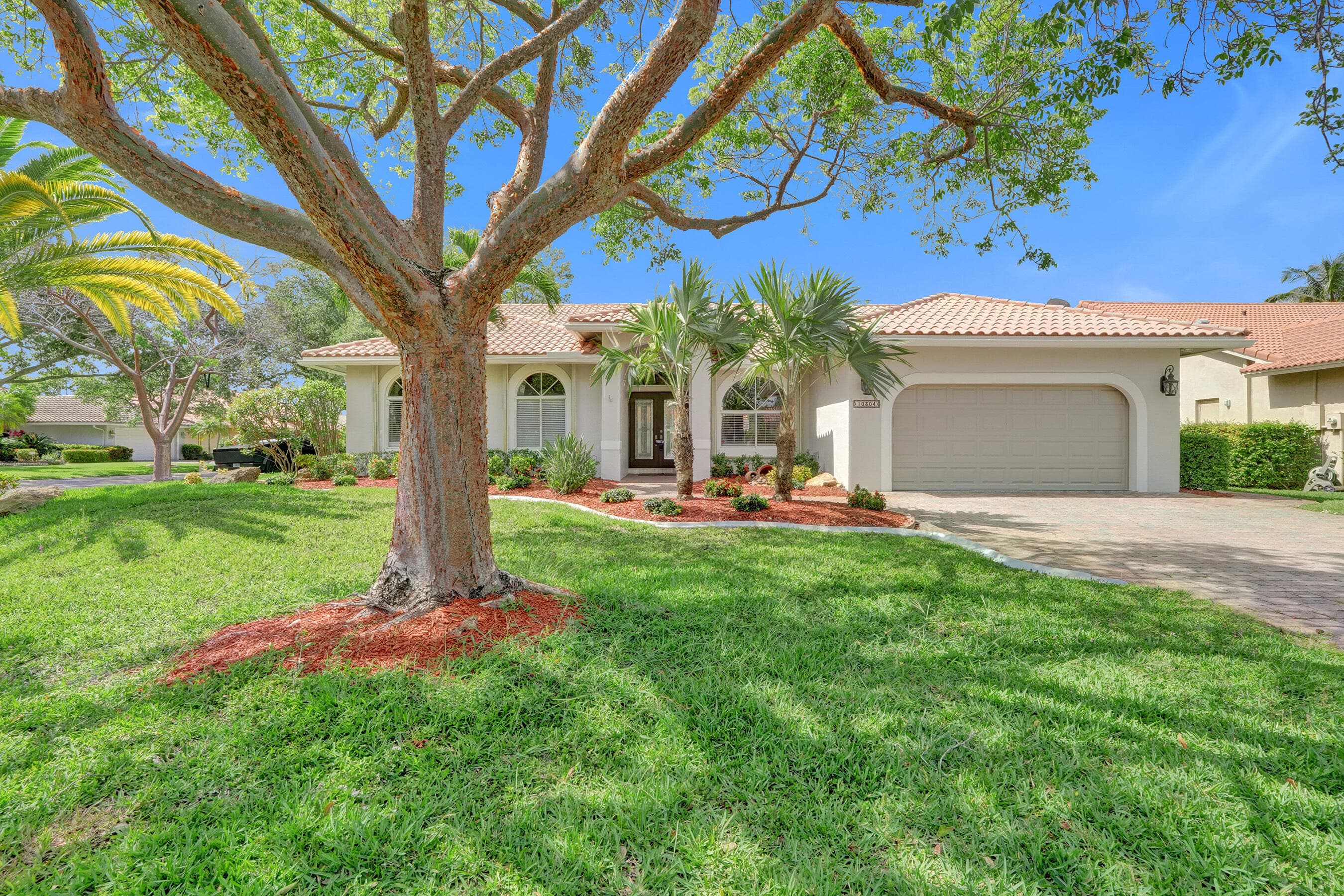 10304 NW 50th Court, Coral Springs, FL 33076 — photo 1 of 52