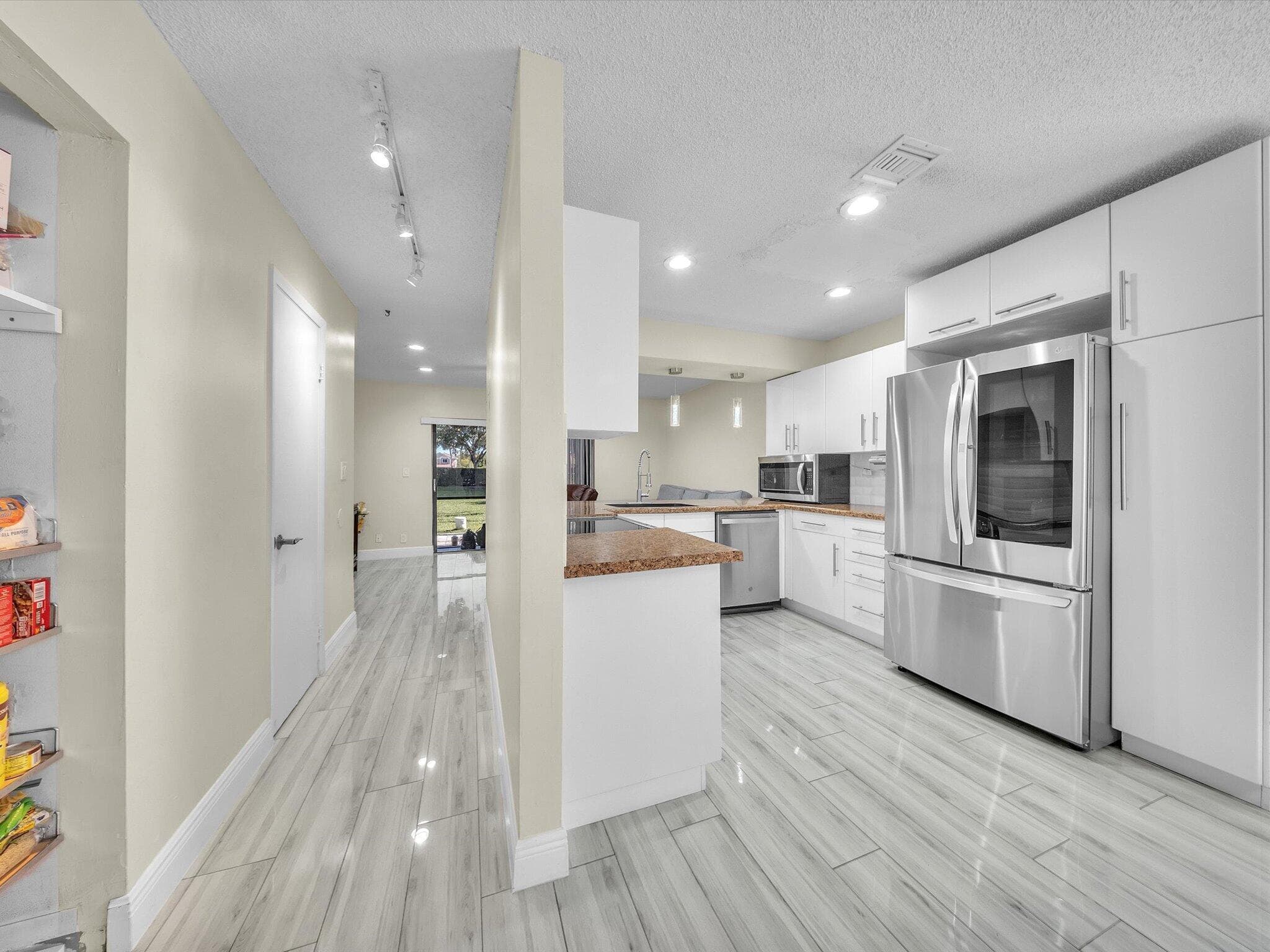 9867 Riverside Drive, Coral Springs, FL 33071 — photo 8 of 31