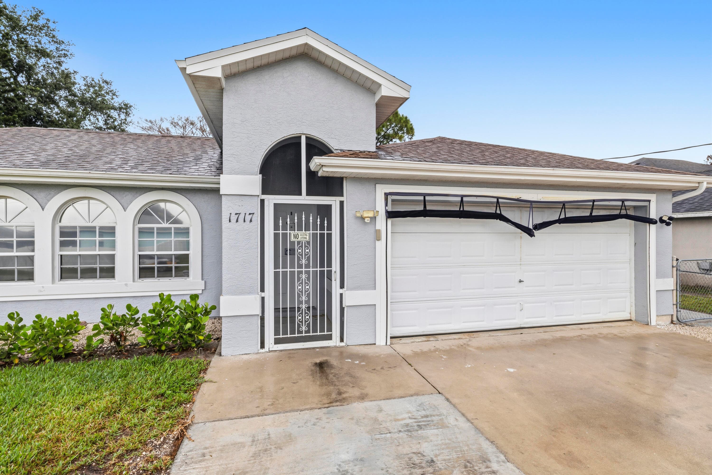 1717 SW Burlington Street, Port St. Lucie, FL 34984 — photo 2 of 38