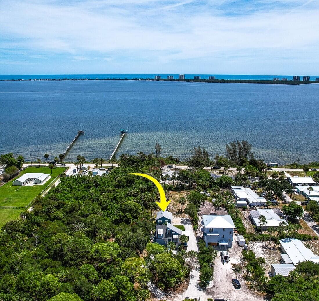 12000 Conklin Way, Jensen Beach, FL 34957 — photo 1 of 57