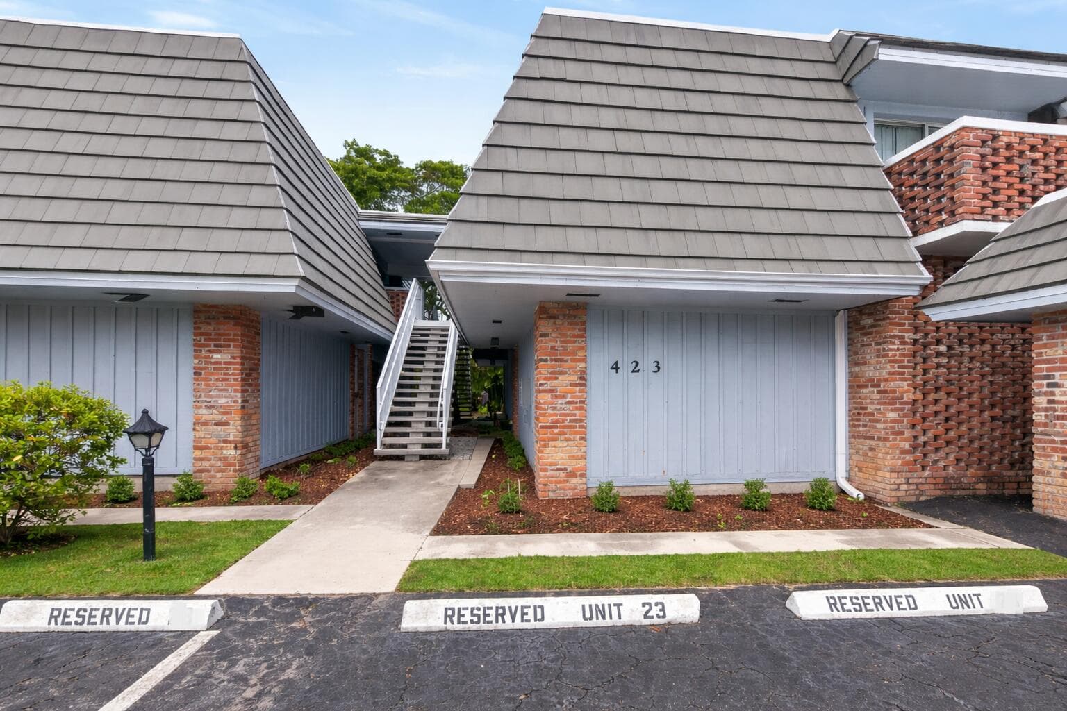 423 Pine Tree Court 23, Atlantis, FL 33462 — photo 1 of 33