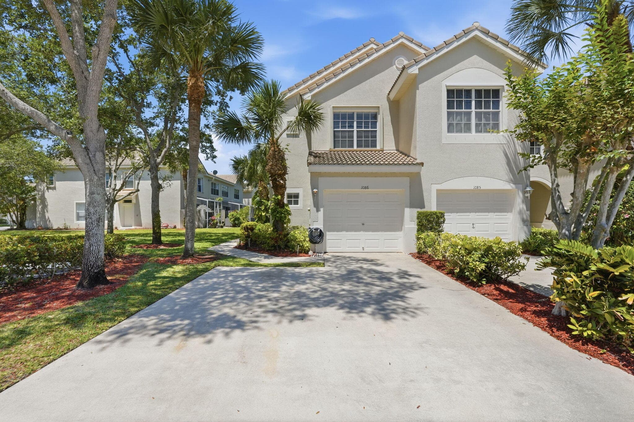 1086 Woodfield Road, Greenacres, FL 33415 — photo 1 of 32