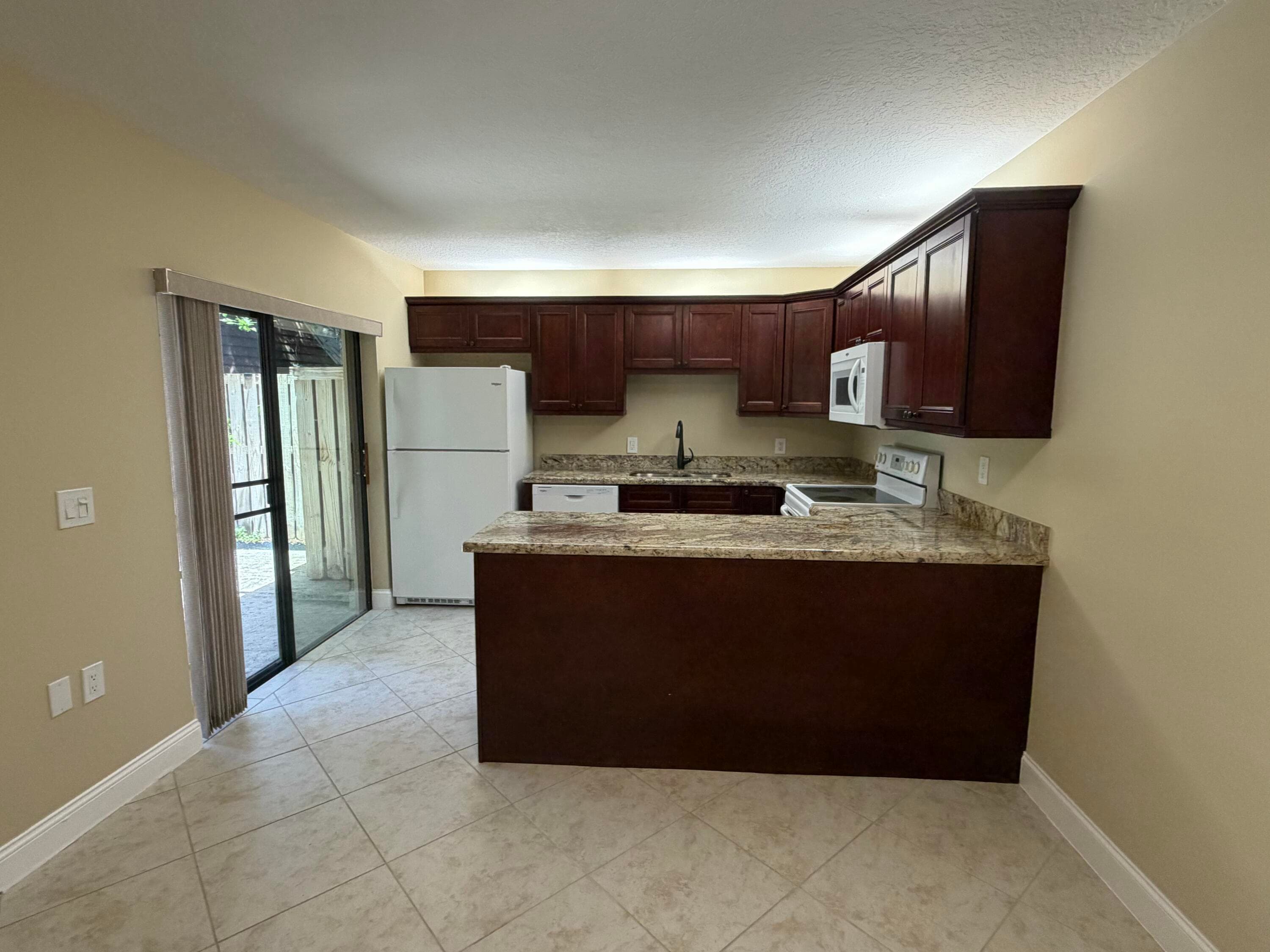 2407 24th Lane, Palm Beach Gardens, FL 33418 — photo 2 of 18