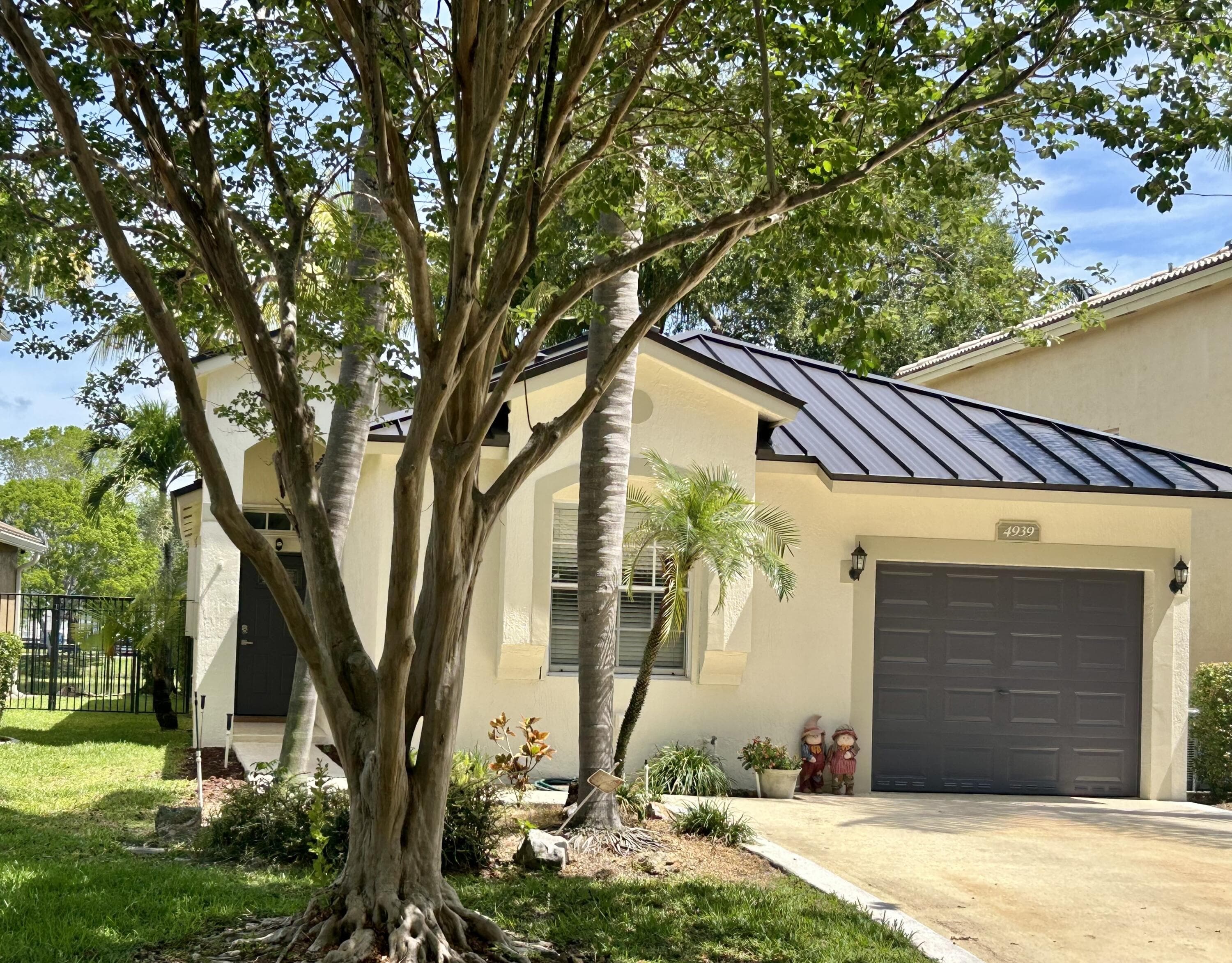 4939 Pelican Street, Coconut Creek, FL 33073 — photo 2 of 32