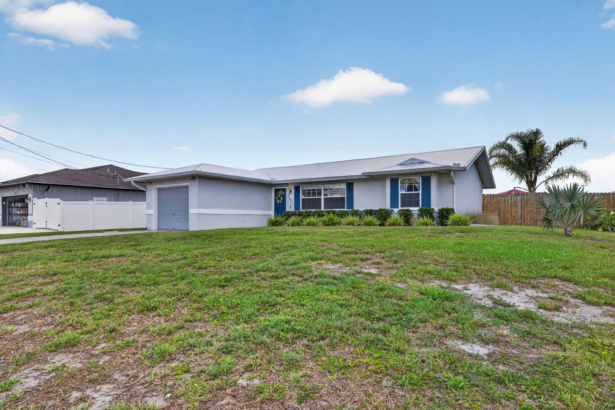 1031 SW Idol Avenue, Port St. Lucie, FL 34953 — photo 2 of 56