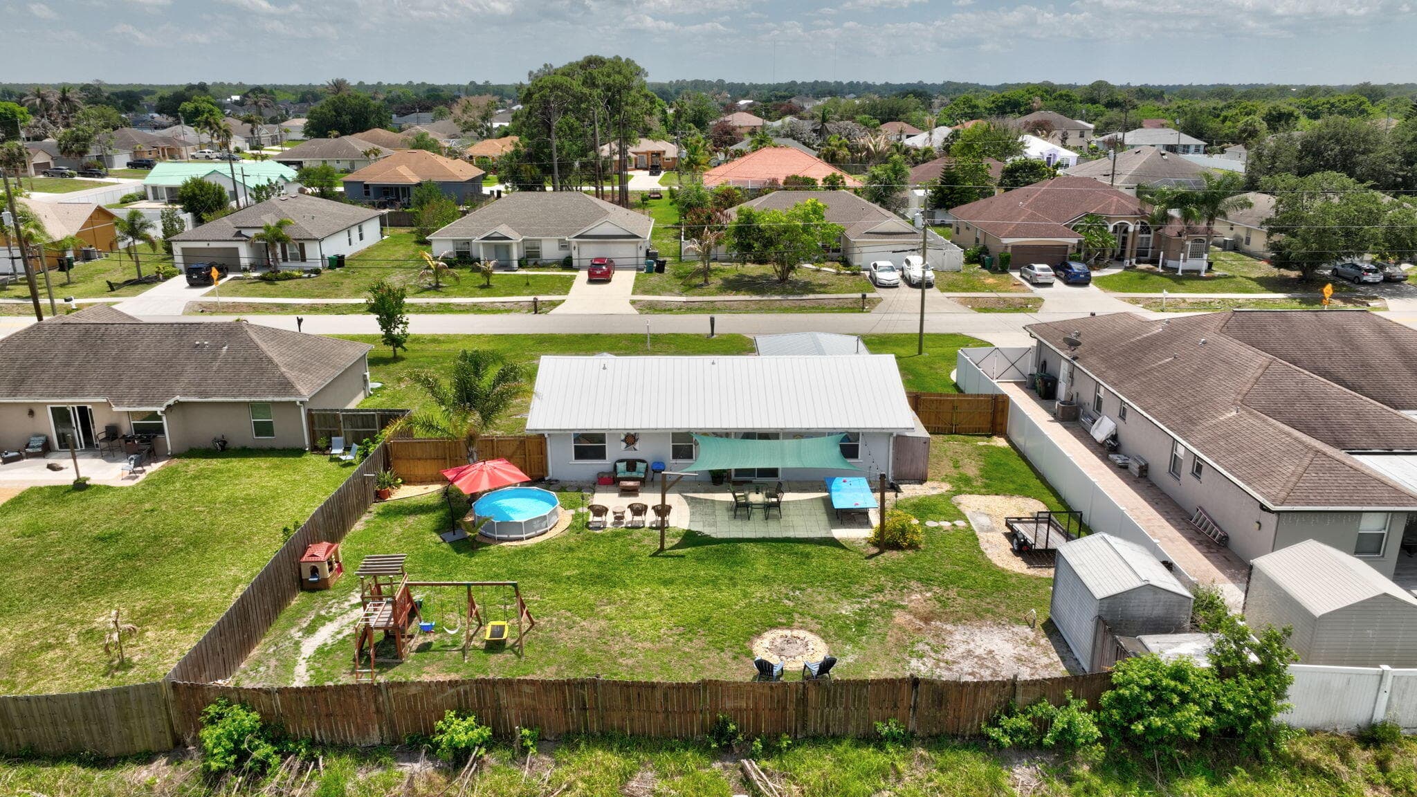 1031 SW Idol Avenue, Port St. Lucie, FL 34953 — photo 53 of 56