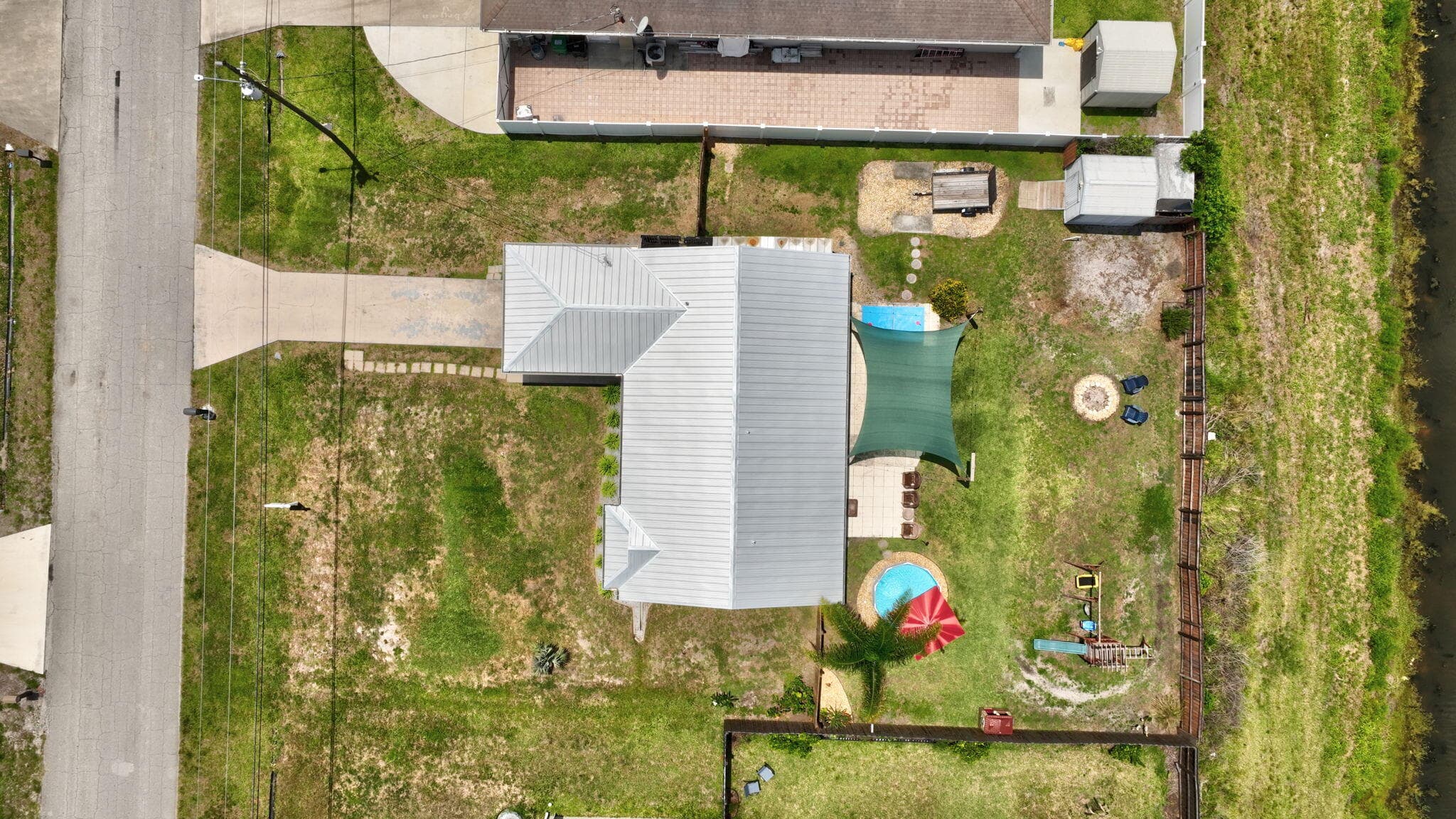 1031 SW Idol Avenue, Port St. Lucie, FL 34953 — photo 54 of 56
