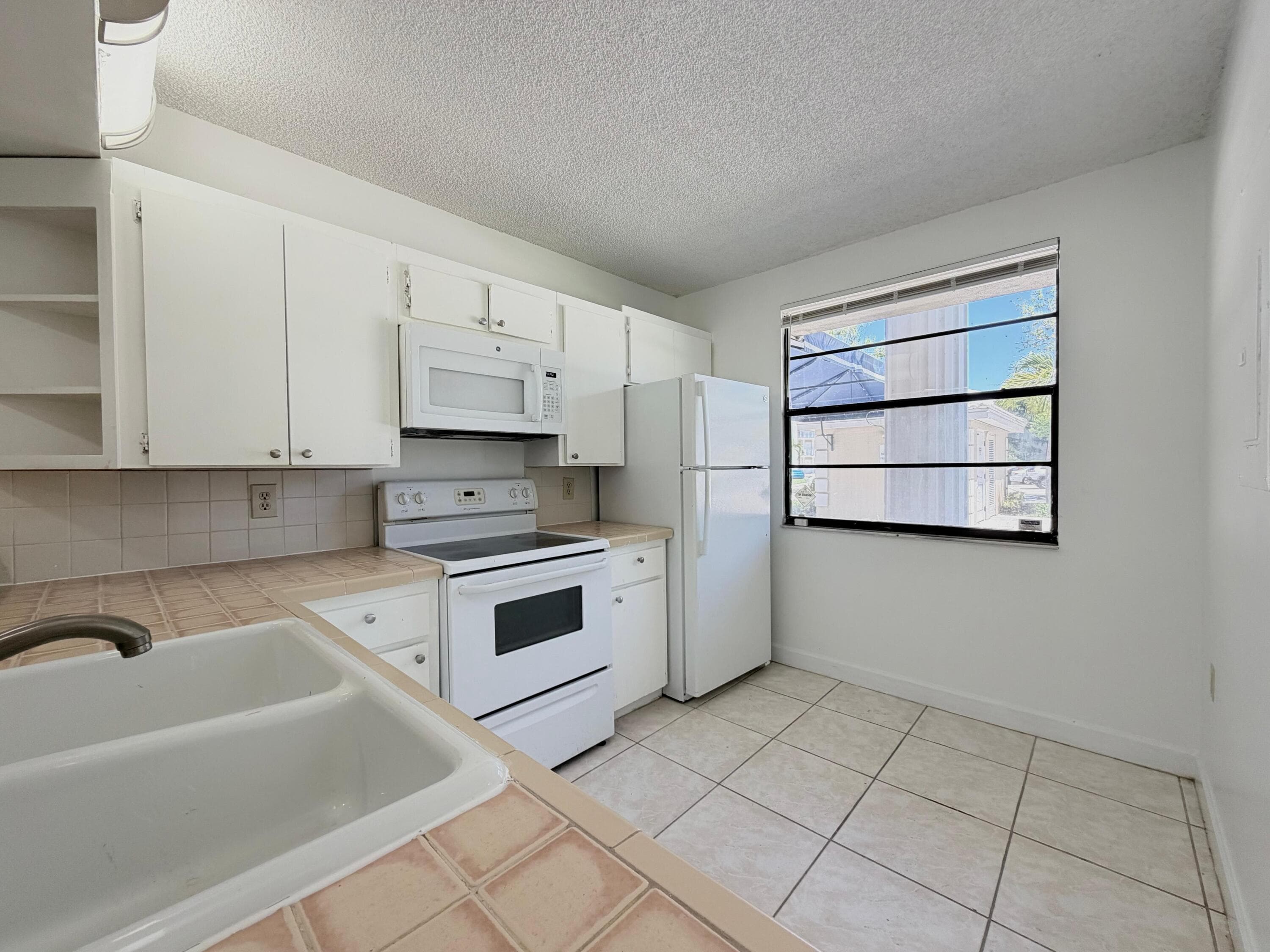 3511 Village Boulevard Unit 103, West Palm Beach, FL 33409 — photo 4 of 15