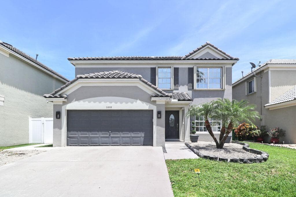 5808 N Plum Bay Parkway, Tamarac, FL 33321 — photo 1 of 14