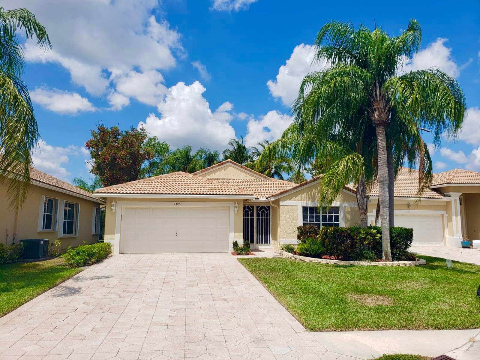 2425 Pigeon Cay, West Palm Beach, FL 33411 — photo 1 of 31