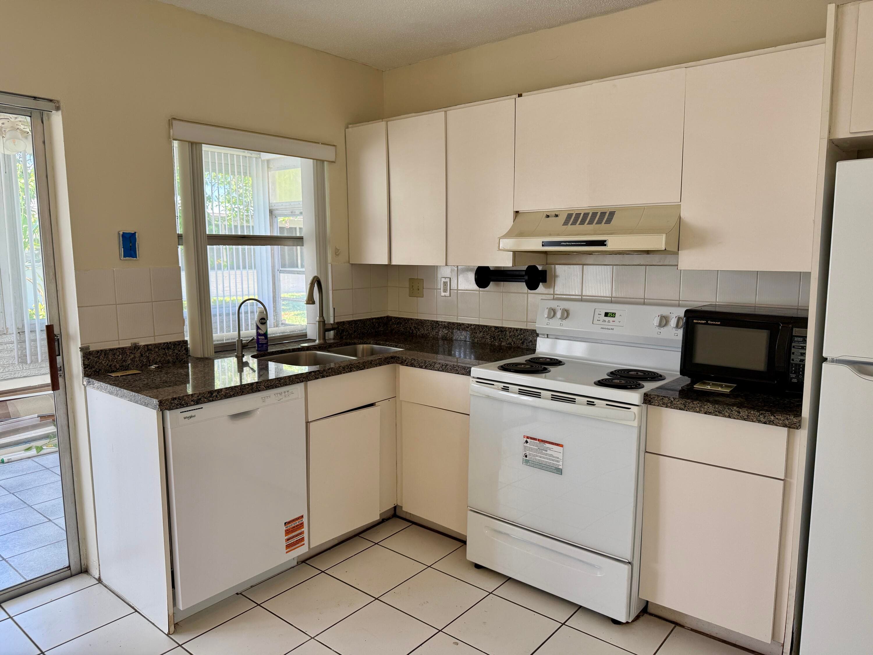 7105 NW 70th Court, Tamarac, FL 33321 — photo 14 of 26