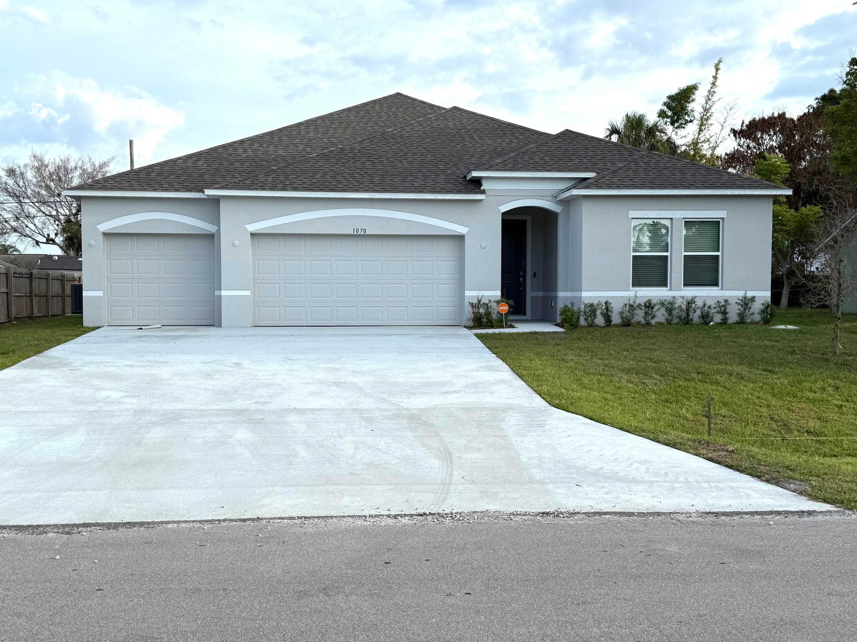1070 SW Versailles Avenue, Port St. Lucie, FL 34953 — photo 1 of 35