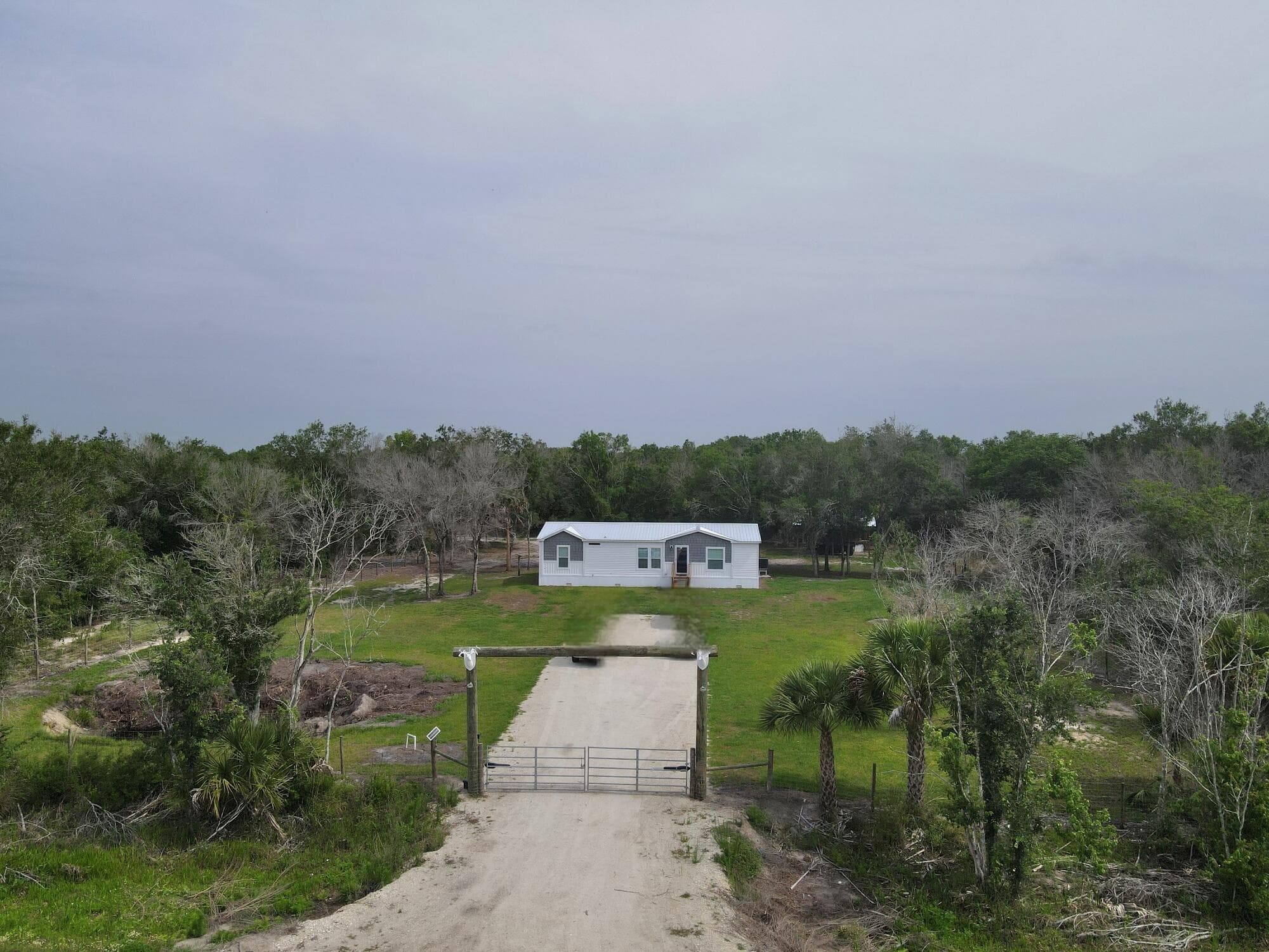 19411 NW 258th Street, Okeechobee, FL 34972 — photo 1 of 44