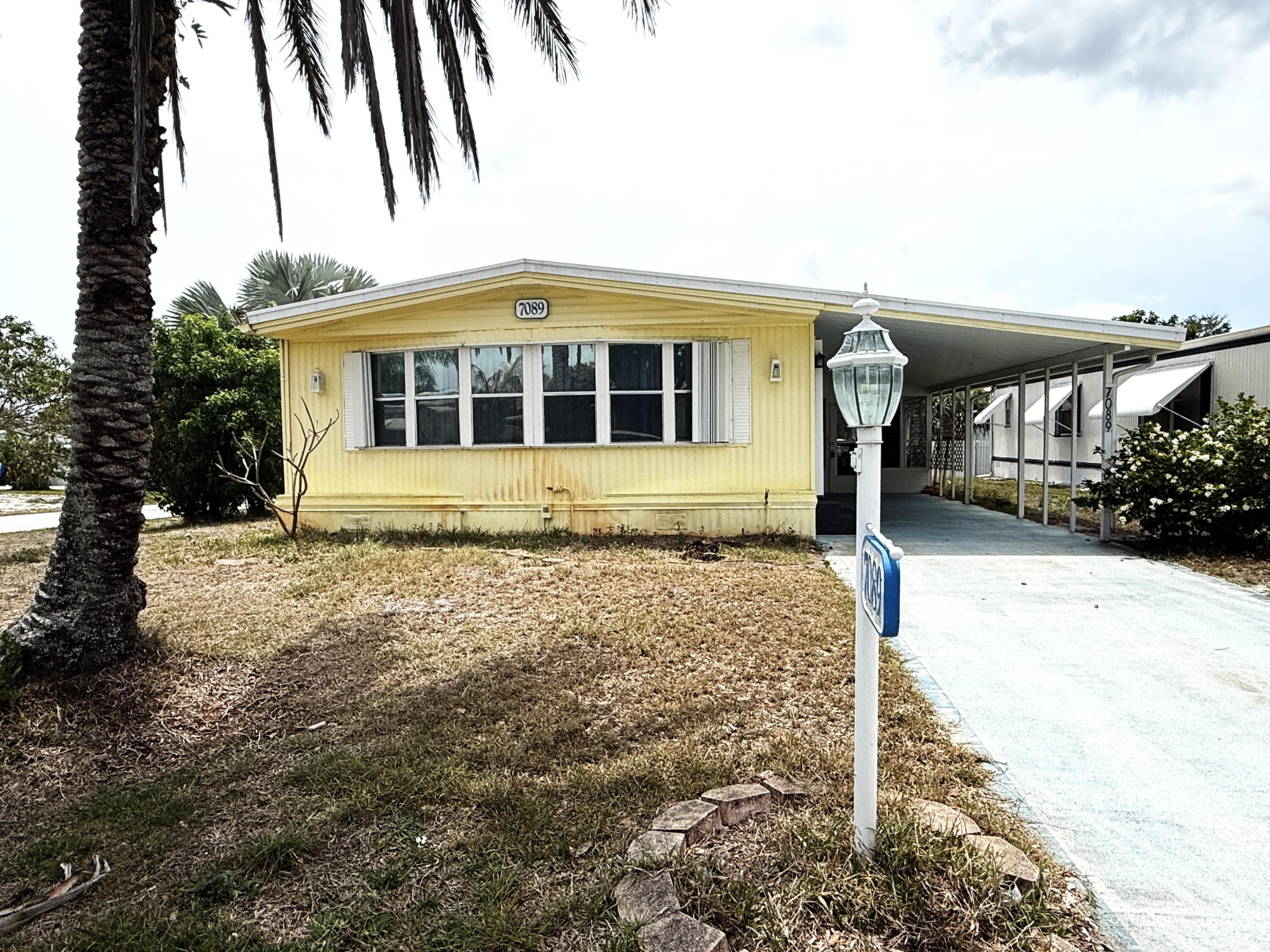 7089 SE Bluebird Circle, Hobe Sound, FL 33455 — photo 1 of 47