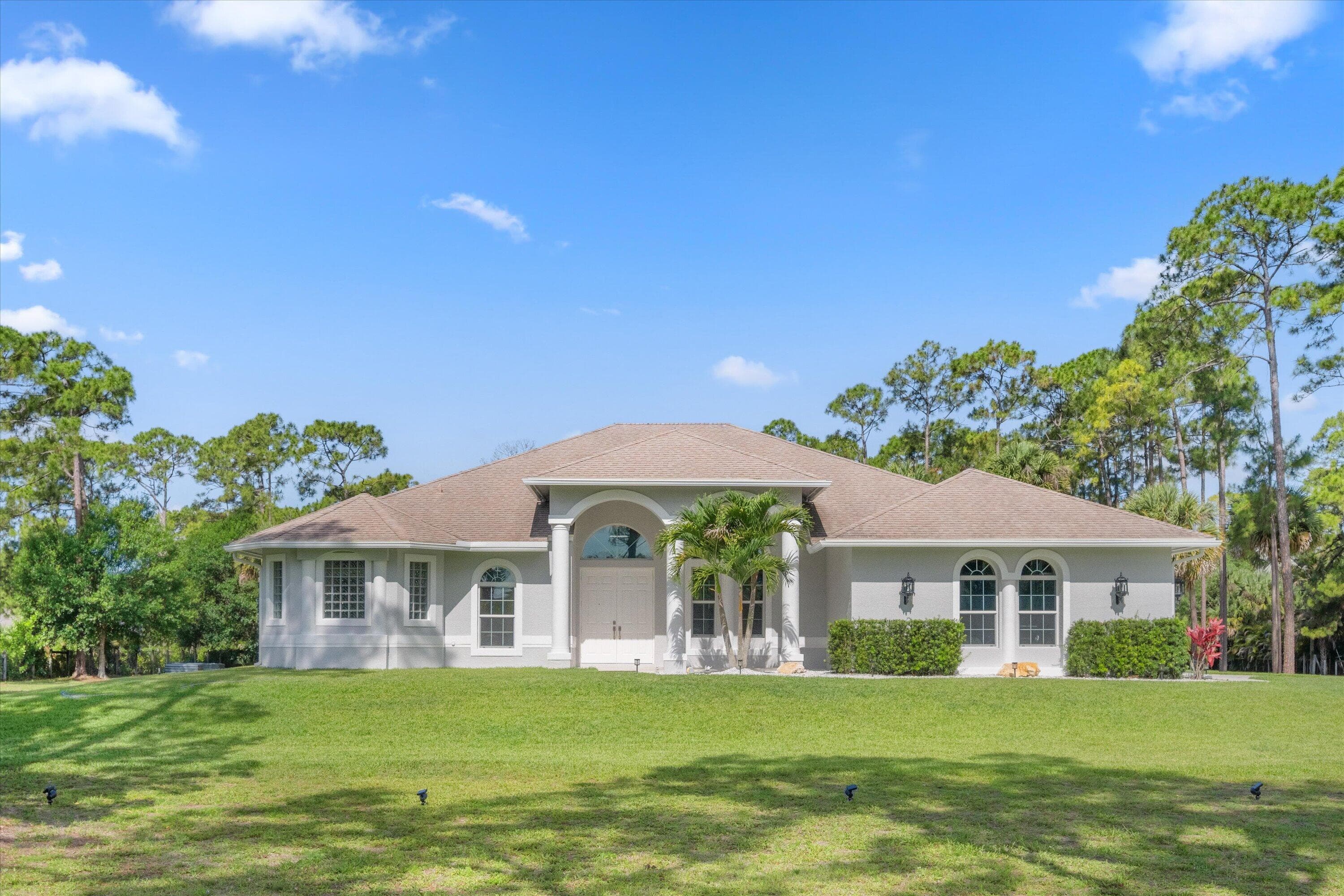 17038 N 61st Pl Place N, The Acreage, FL 33470 — photo 1 of 104