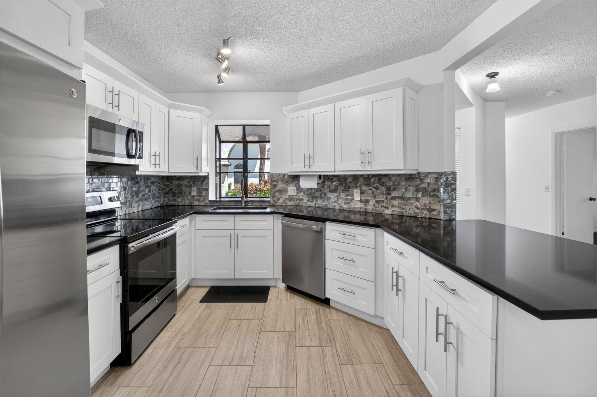 5259 Europa Drive D, Boynton Beach, FL 33437 — photo 1 of 64