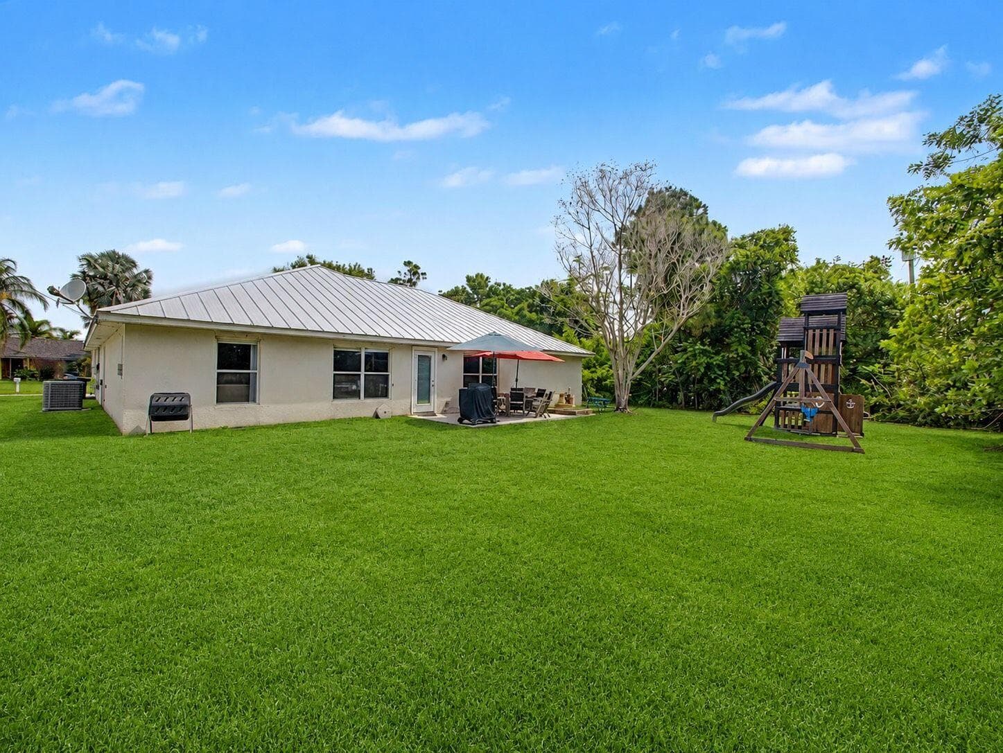 1550 SW Kosnar Avenue, Port St. Lucie, FL 34953 — photo 27 of 31