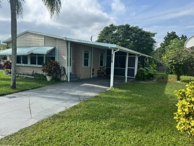 6059 Palm Harbour Drive, Atlantis, FL 33462 — photo 2 of 33