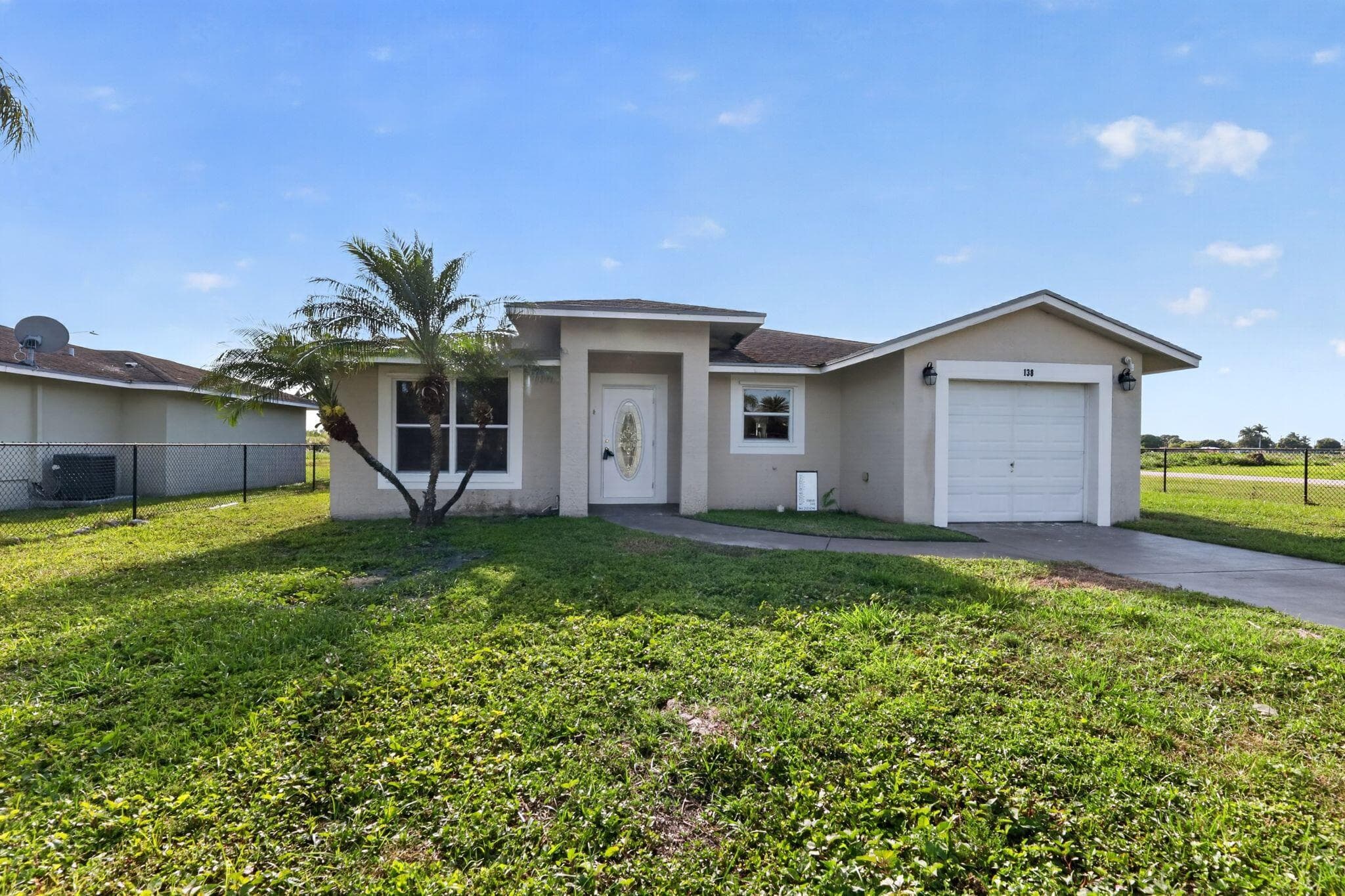 138 Dabou Loop, Belle Glade, FL 33430 — photo